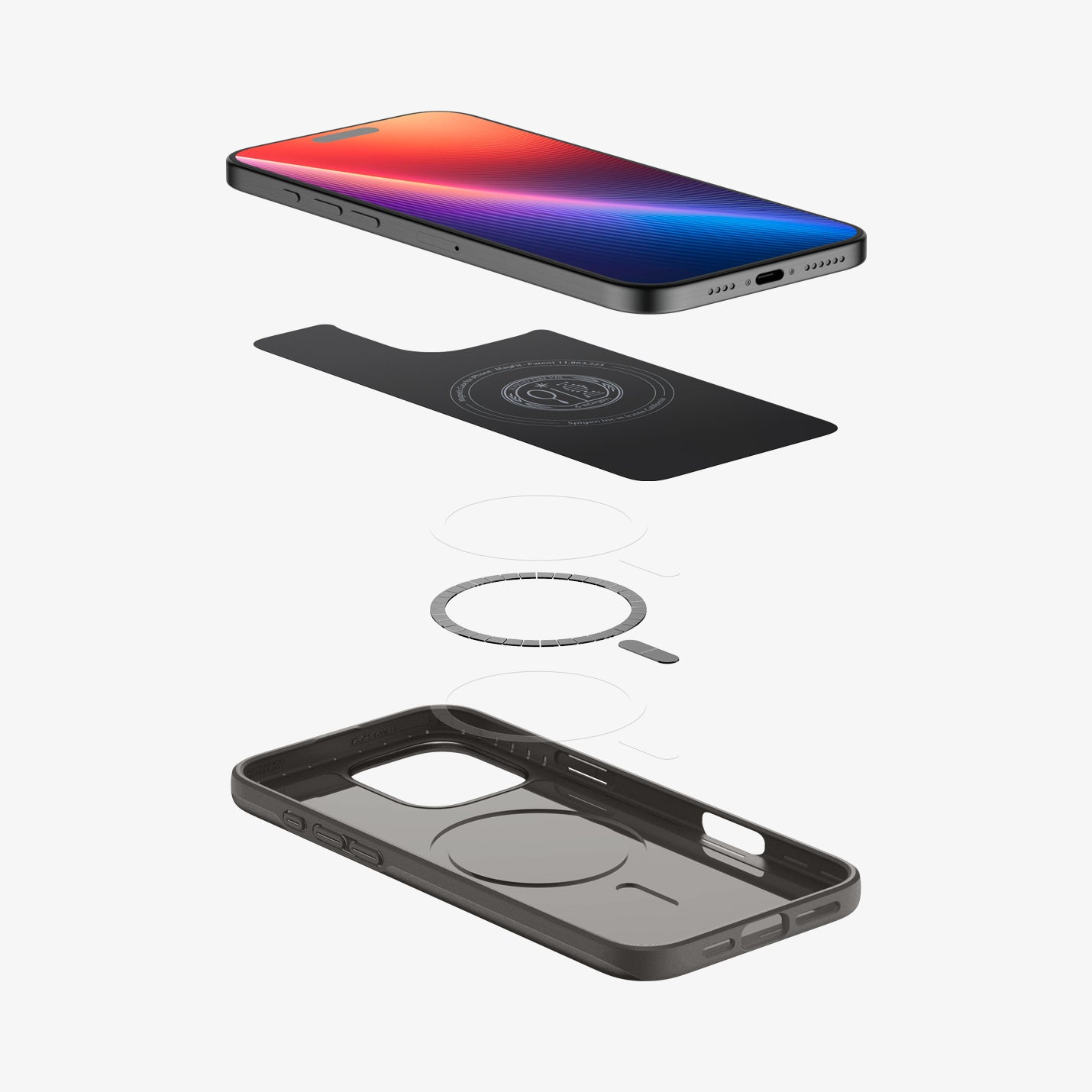 Vista esplosa di telefono, scheda, anello e custodia. Il telefono ha uno schermo colorato. La custodia è grigio scuro.
