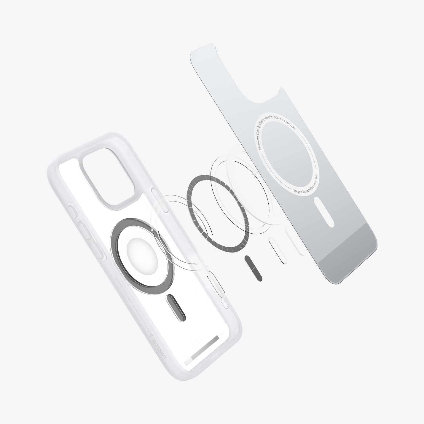Una custodia trasparente per telefono con un anello magnetico, una piastra di allineamento e vari elementi circolari e rettangolari.
