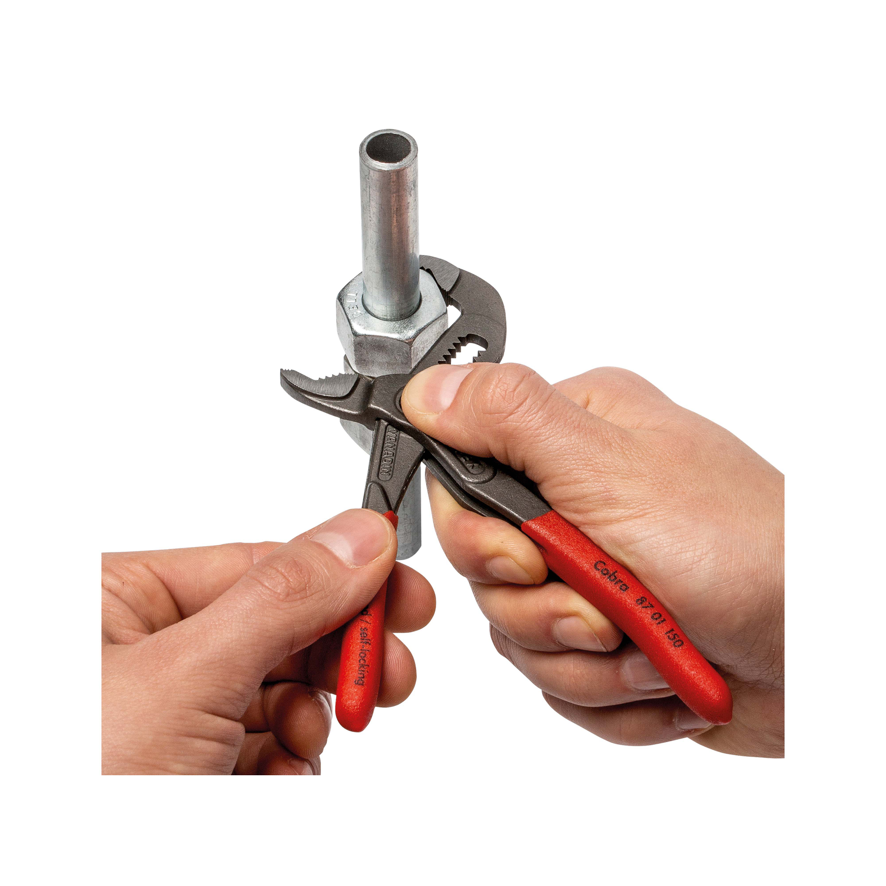 Hands using pliers to grip a nut on a metal pipe. The pliers are red and black. The background is white.