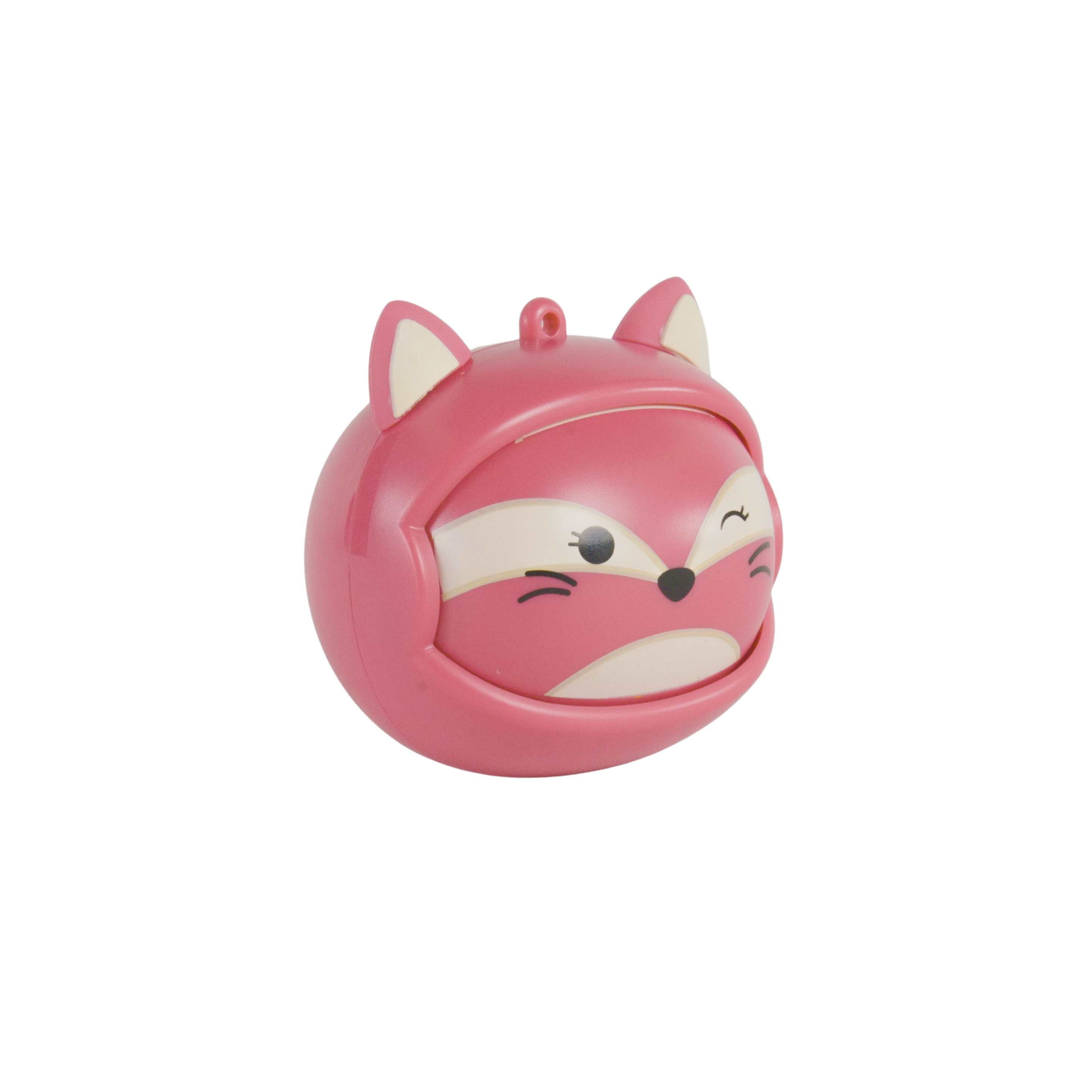 A pink fox-shaped container with white accents. It has a winking eye and a small loop at the top.