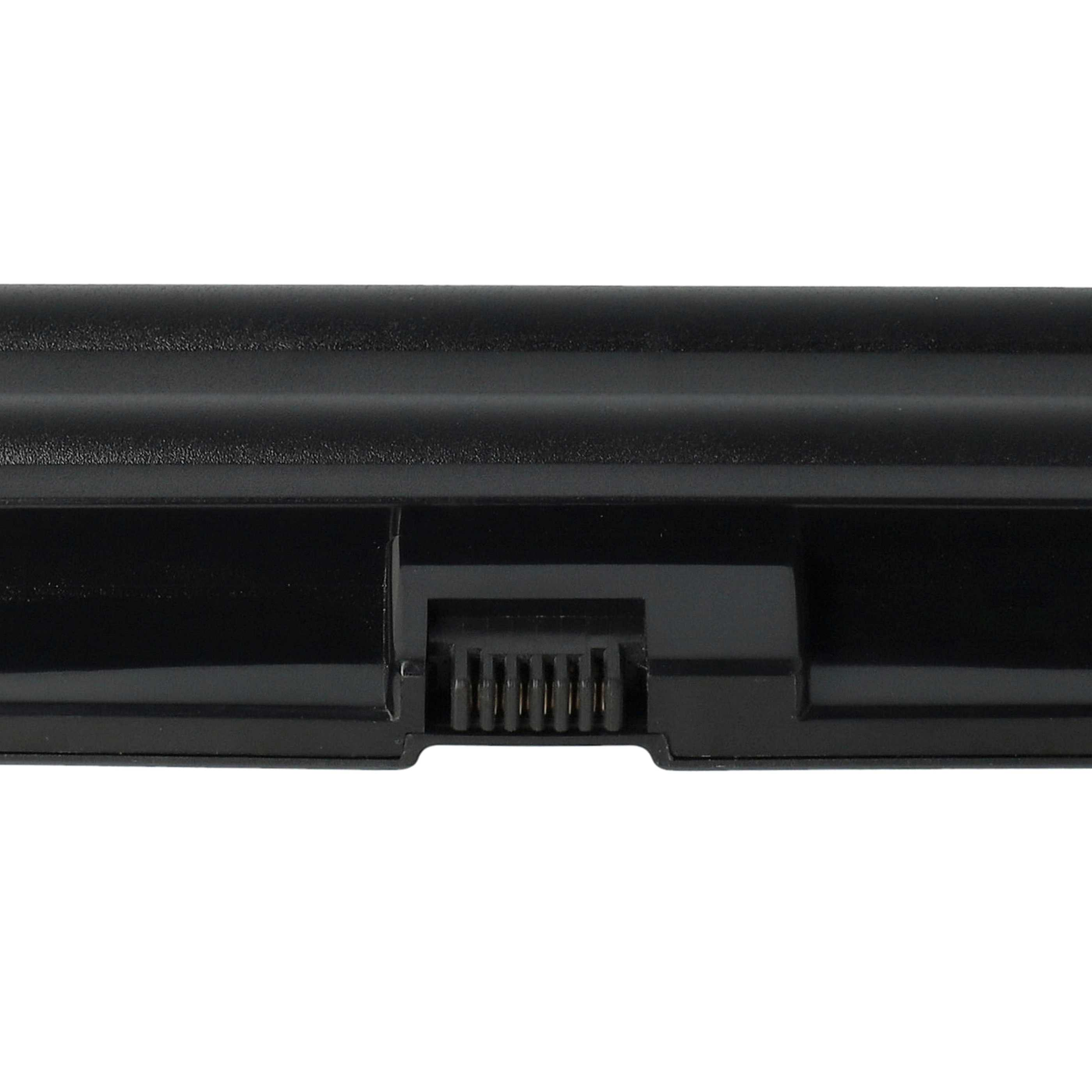 Ein schwarzer Laptop-Akku. Die Oberseite ist glatt, die Unterseite hat einen Stecker mit Goldstiften.