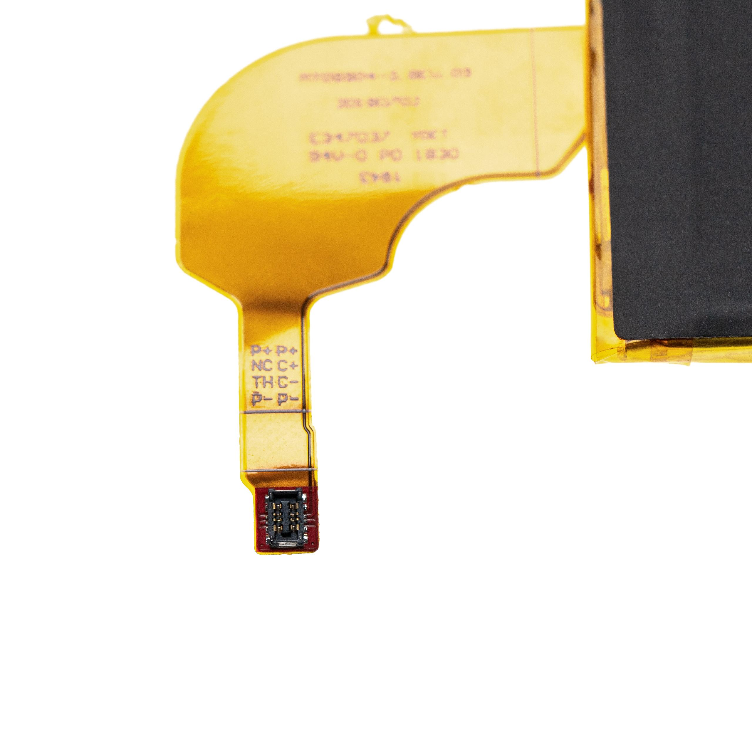 Eine gelb-schwarze elektronische Komponente. Es hat Schrift darauf, mit einem kleinen Stecker unten.