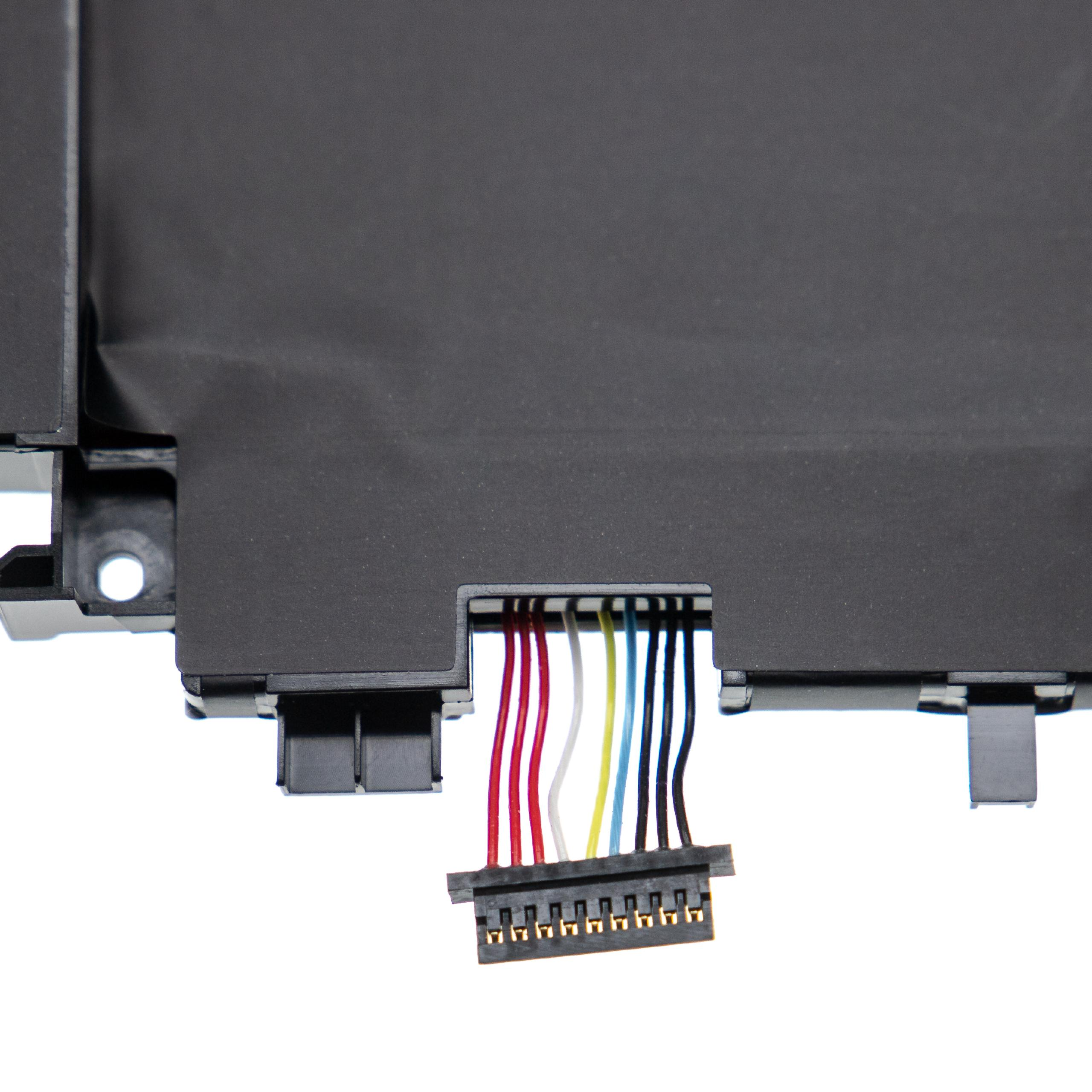 Eine schwarze elektronische Komponente mit farbigen Drähten, die an einen Stecker angeschlossen sind, vor weißem Hintergrund.