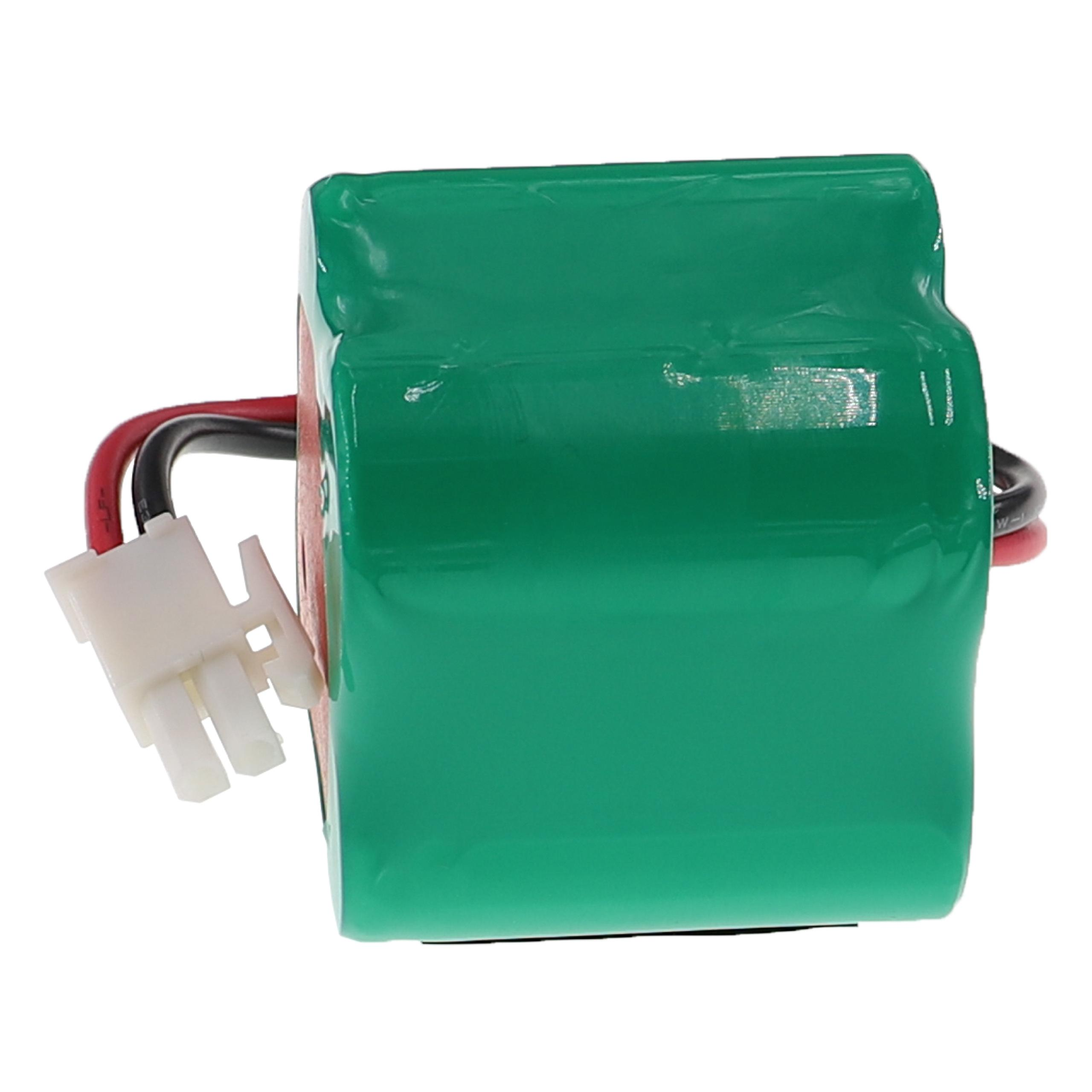 Ein grüner, zylindrischer Akku mit schwarzen und roten Drähten und einem weißen Stecker.