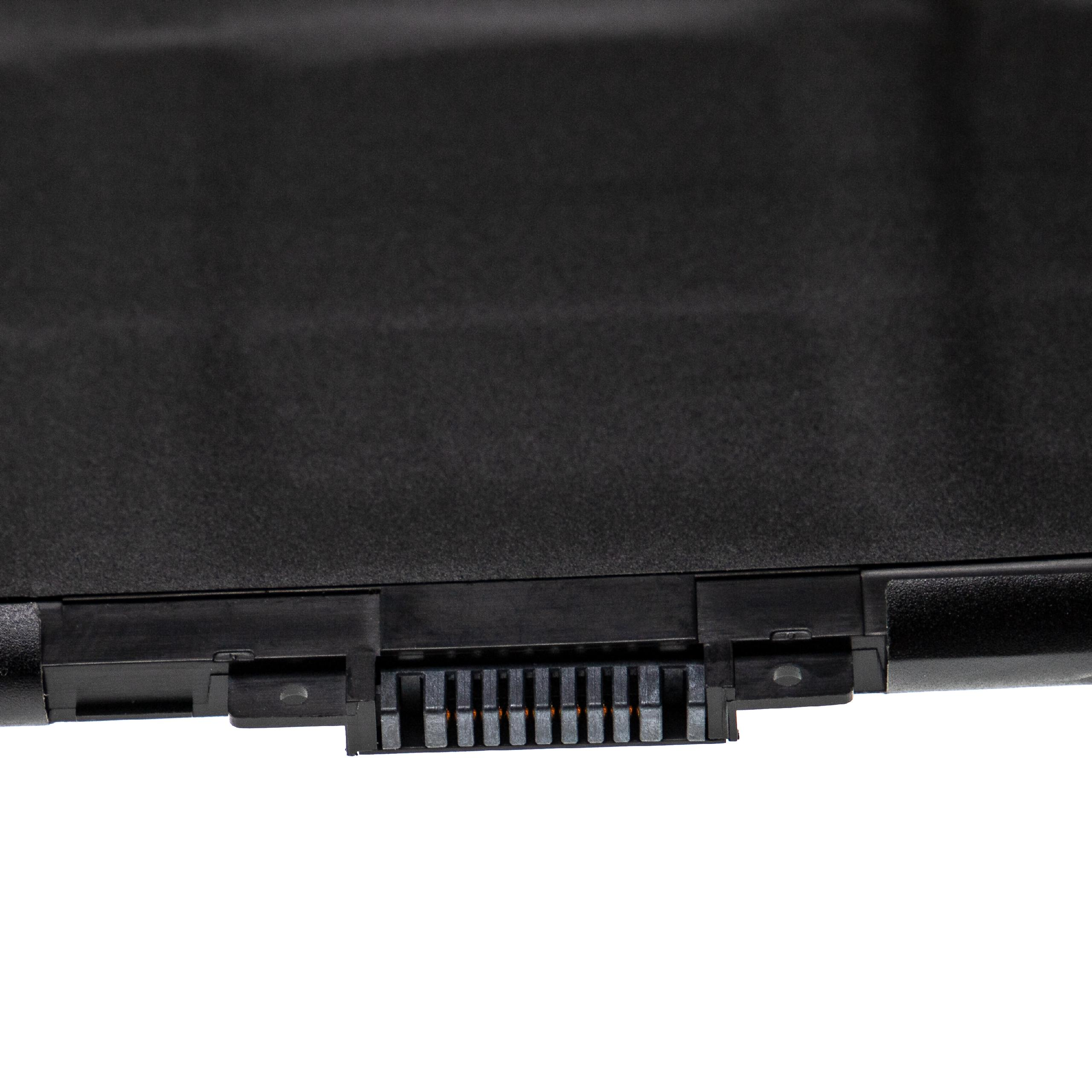 Nahaufnahme eines schwarzen Laptop-Batterieanschlusses. Der Anschluss hat Metallstifte, der Hintergrund ist weiß.