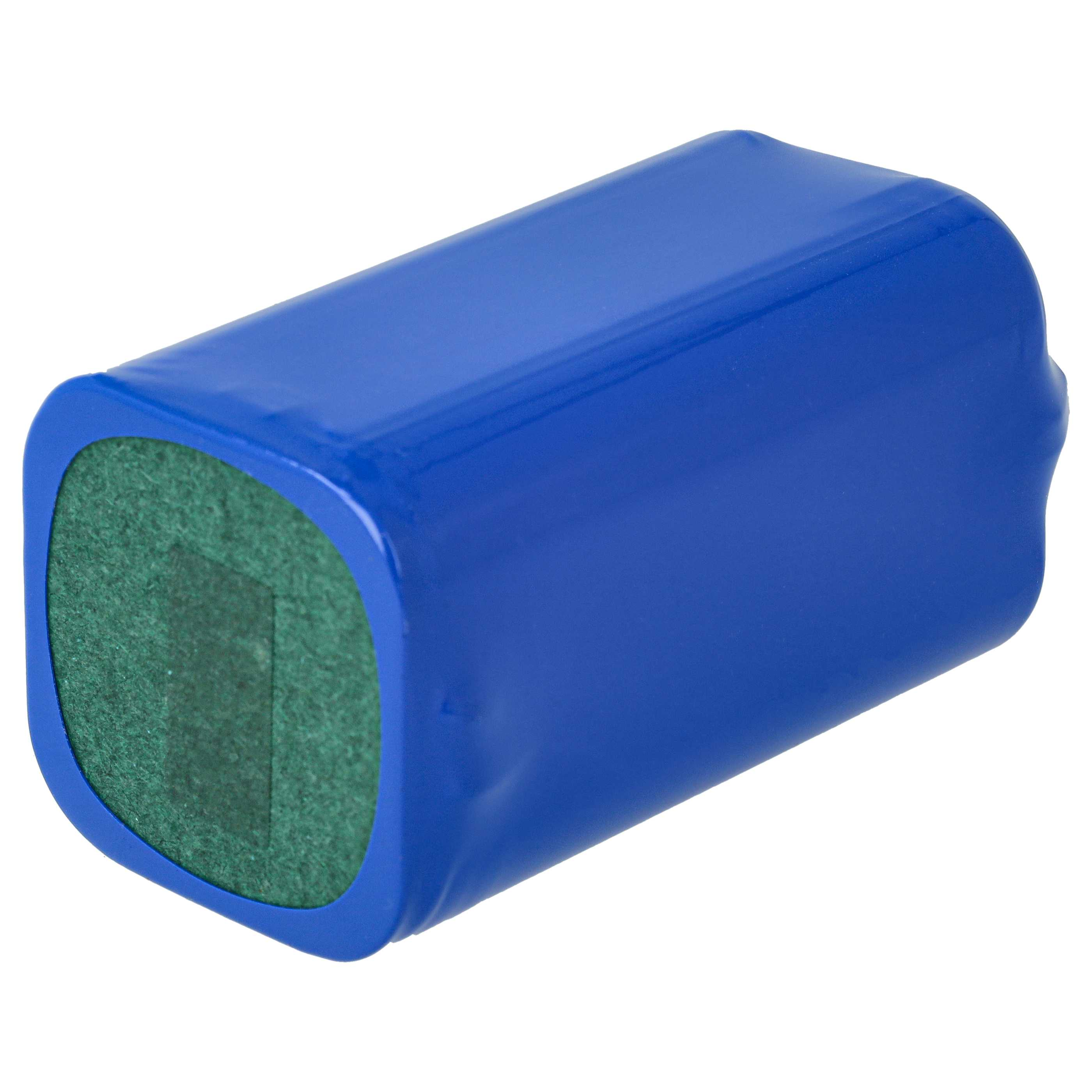 Ein blaues, rechteckiges Objekt, möglicherweise eine Batterie, mit einem grünen, strukturierten Ende und abgerundeten Ecken.
