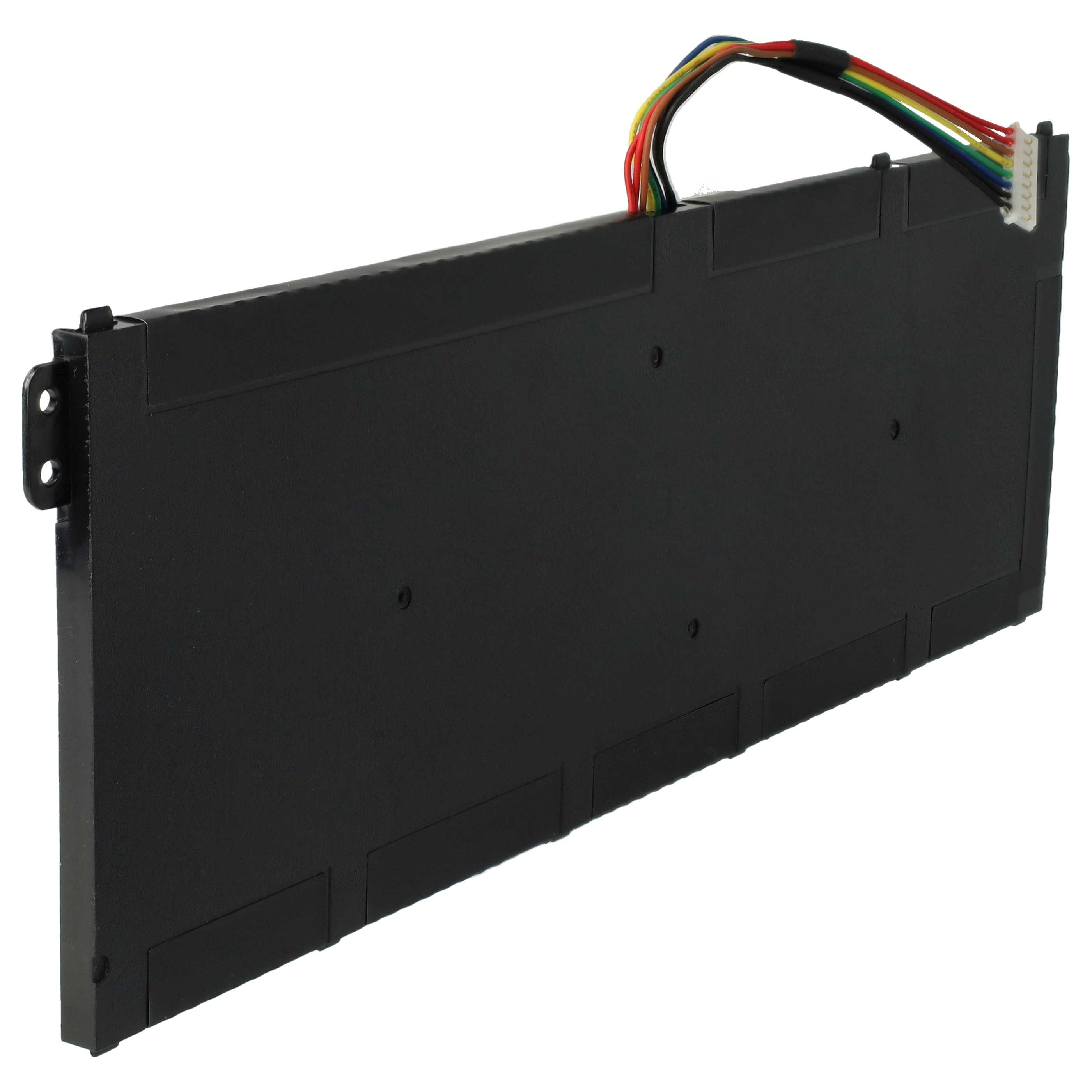 Eine schwarze elektronische Komponente mit farbigen Drähten. Die Komponente ist rechteckig mit mehreren kleinen Löchern.