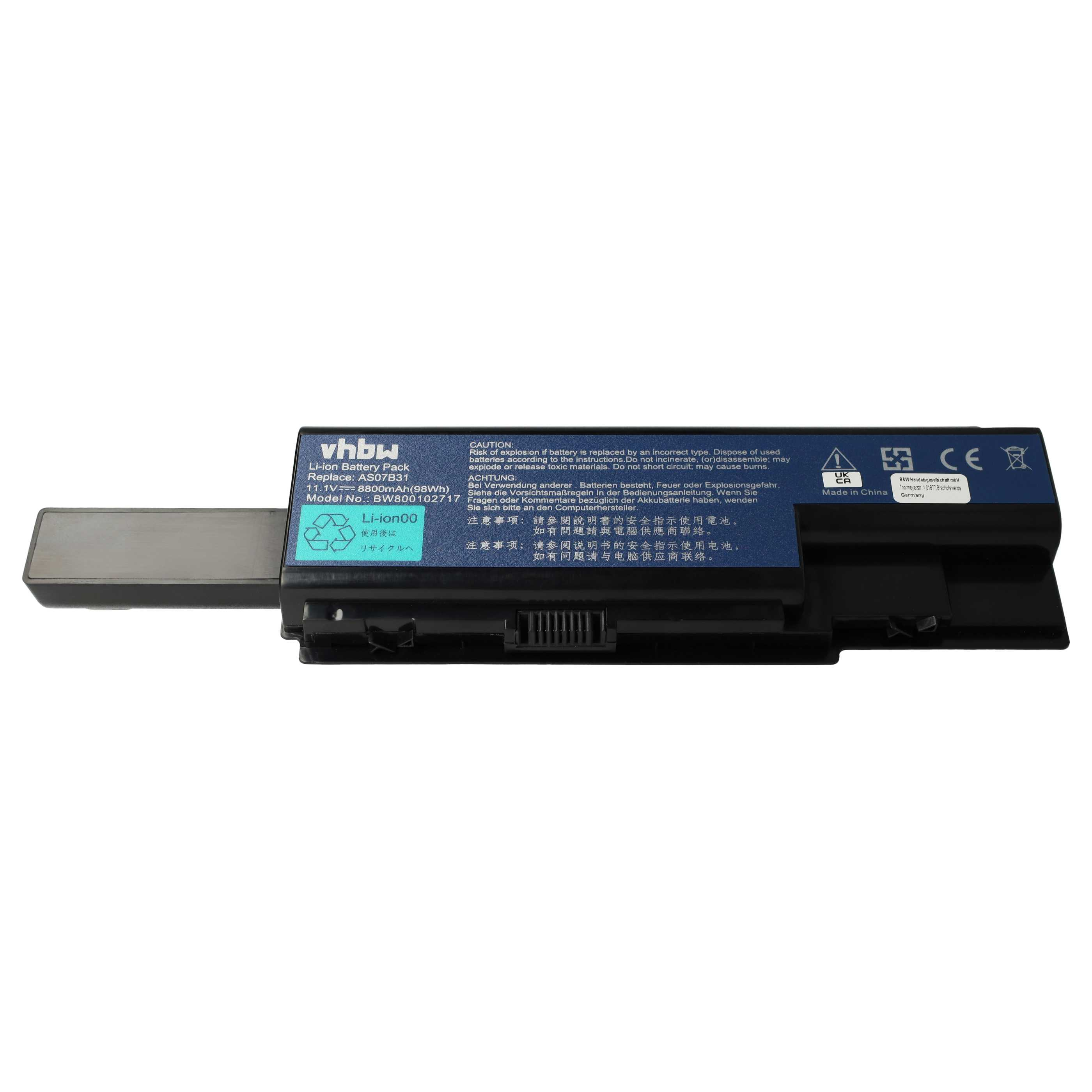 Ein schwarzer und blauer Laptop-Akku mit Textetiketten. Der Markenname ist vhbw. Es gibt auch Warnhinweise.