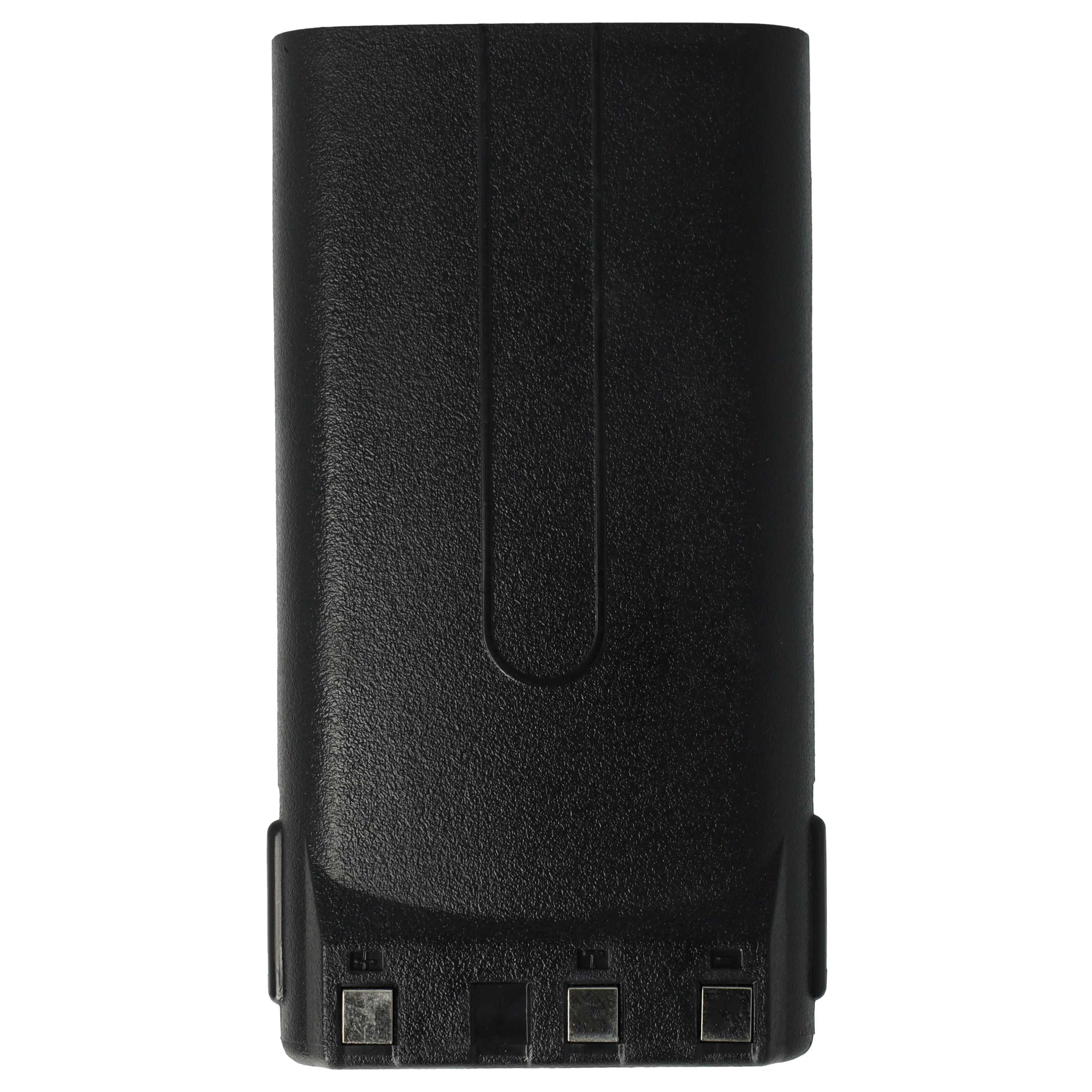 Ein schwarzes, rechteckiges Objekt, das einer Batterie ähnelt. Es hat eine strukturierte Oberfläche und einige kleine Metallverbinder.