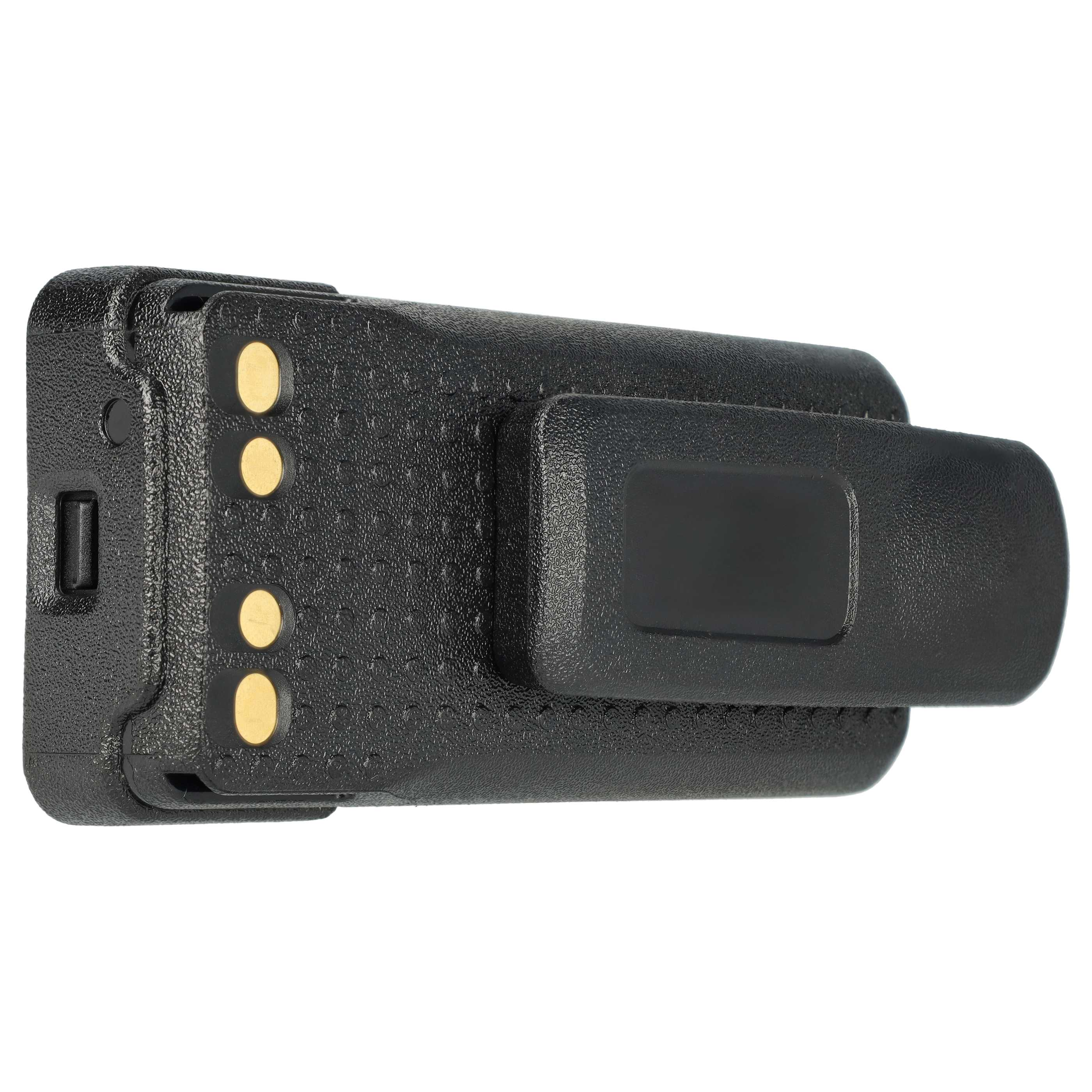 Ein schwarzes Gerät mit goldfarbenen Knöpfen und einem Gürtelclip wird vor weißem Hintergrund gezeigt. Es ist wahrscheinlich ein Funkgerätzubehör.
