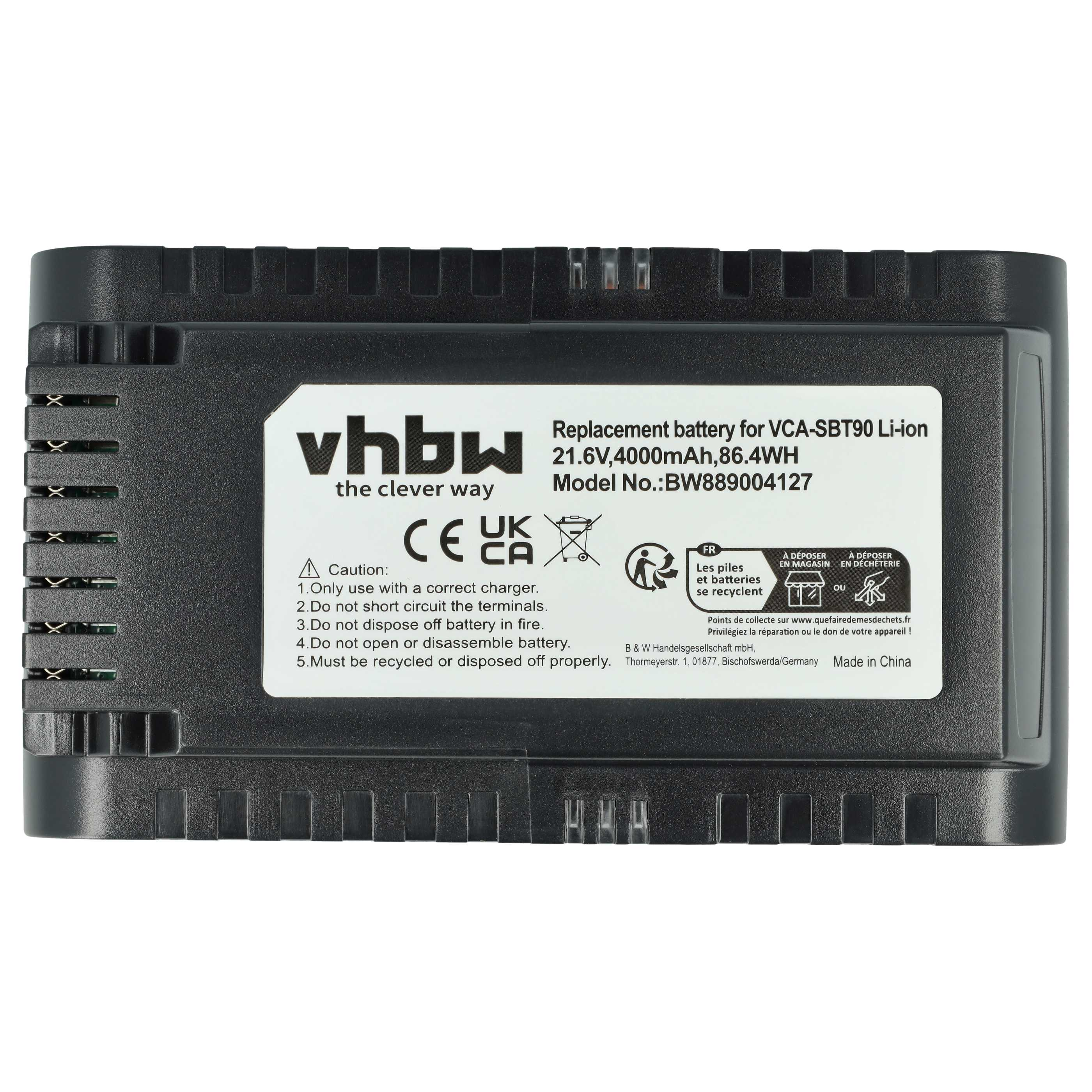 Ein schwarzer Ersatzakku mit weißem Text, Warnungen und Symbolen. Er ist mit VCA-SBT90 Li-ion beschriftet.