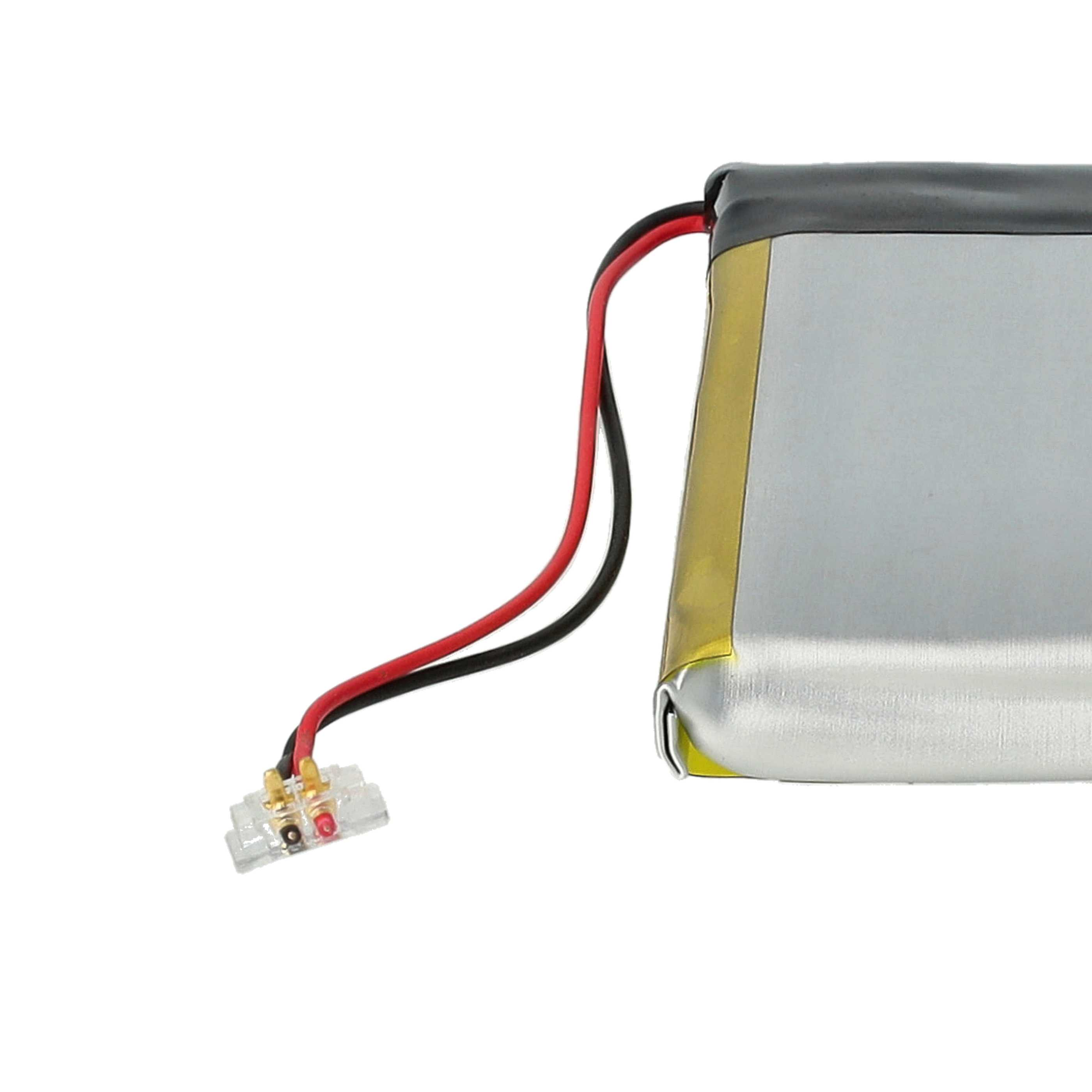 Ein Akku mit schwarzen und roten Drähten, die mit einem kleinen, durchsichtigen Stecker verbunden sind. Der Akku ist silbern und schwarz mit einem goldenen Rand.