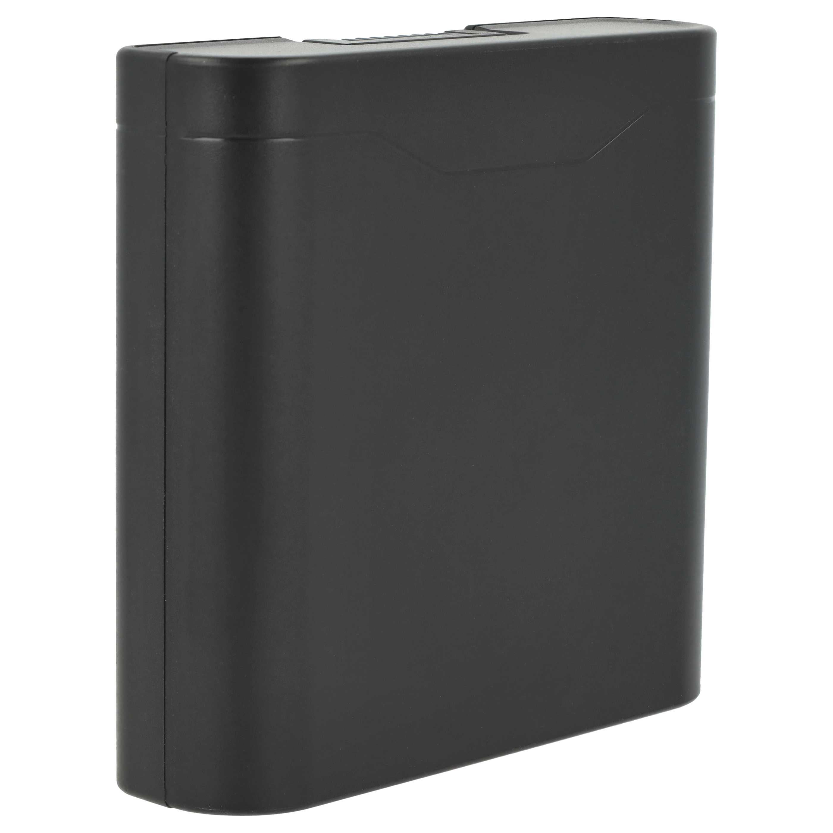 Ein schwarzes rechteckiges Objekt, möglicherweise eine Batterie oder eine Komponente, vor weißem Hintergrund.