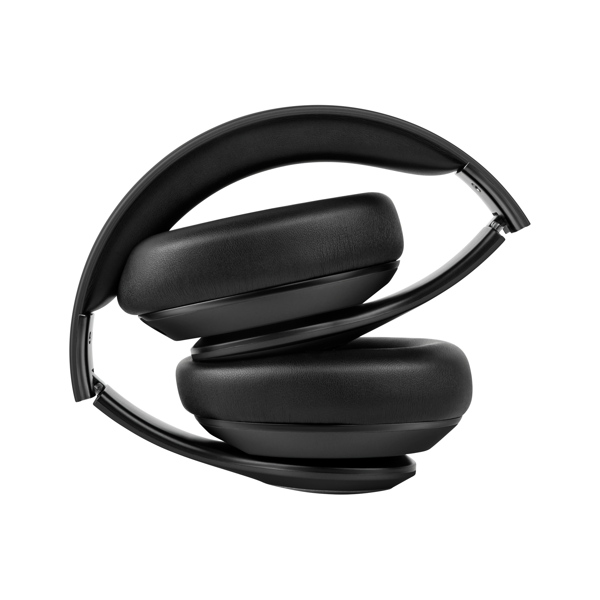 Czarne słuchawki, złożone, spoczywające na jasno-szarej i białej powierzchni. Słuchawki są szczegółowe.