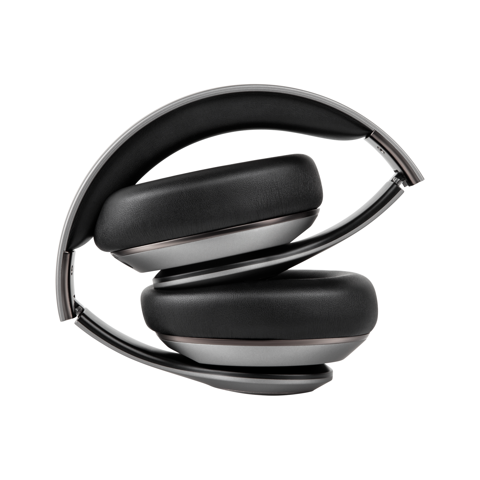 Złożone słuchawki z czarnymi nausznikami i srebrnymi akcentami. Rama jest srebrna. Tło ma pionowe linie.