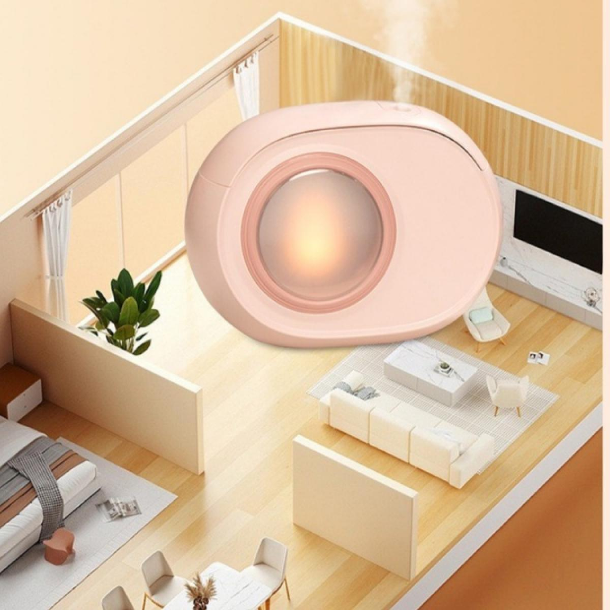 Ein rosa-weißer Luftbefeuchter mit leuchtendem Zentrum befindet sich in einem Miniaturraum. Die Einrichtung umfasst ein Bett, ein Sofa und Stühle.