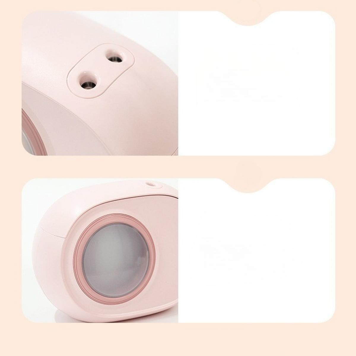Ein rosa, ovales Gerät mit zwei kleinen Löchern oben. Der untere Teil hat eine große, kreisförmige Öffnung mit einem helleren rosa Ring.