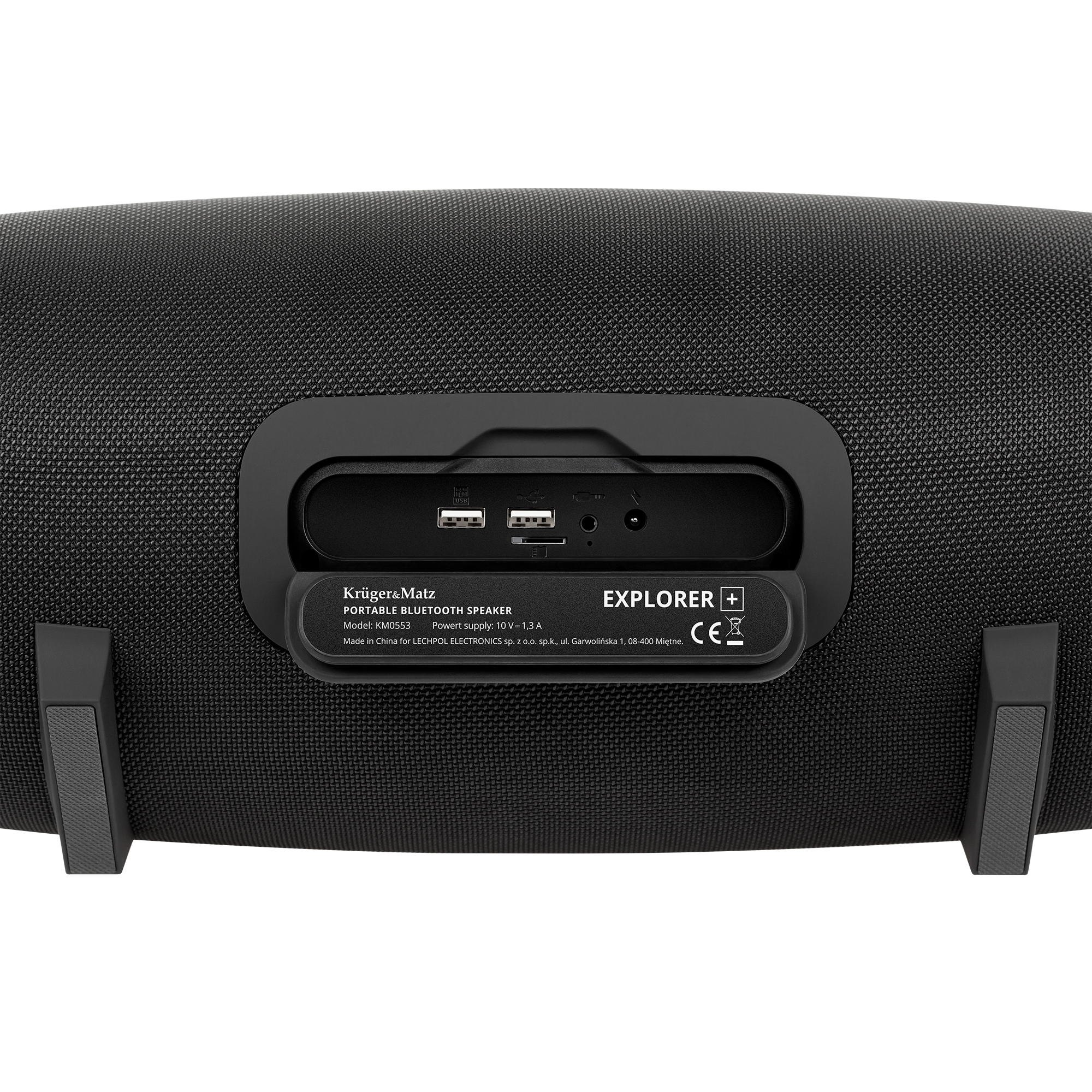 Czarny przenośny głośnik Bluetooth z portami. Tekst na głośniku mówi 'EXPLORER +' i 'Krüger&Matz'.