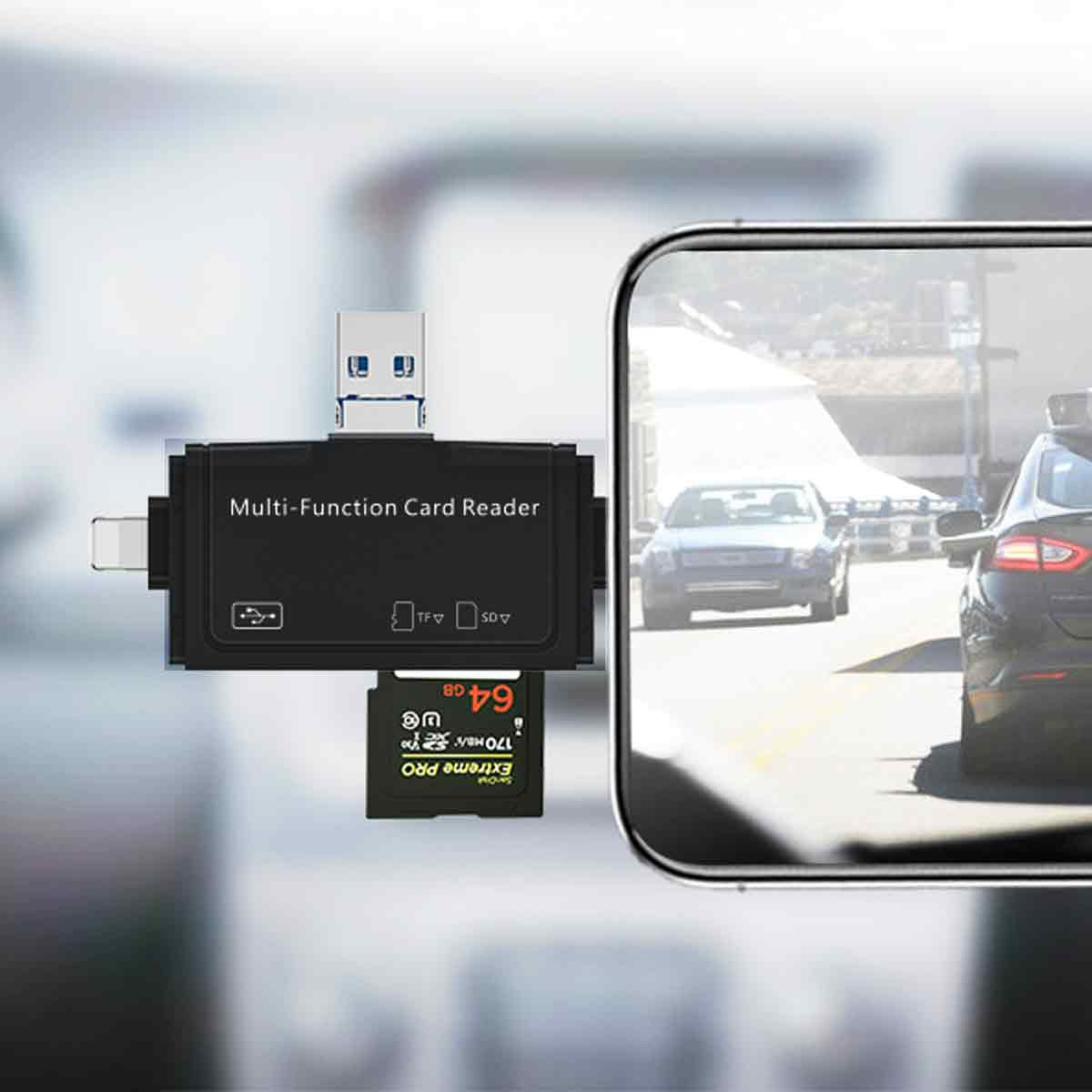 Ein Multifunktions-Kartenleser mit USB-Anschluss und SD-Karte. Ein Mobiltelefon zeigt Autos auf einer Straße.