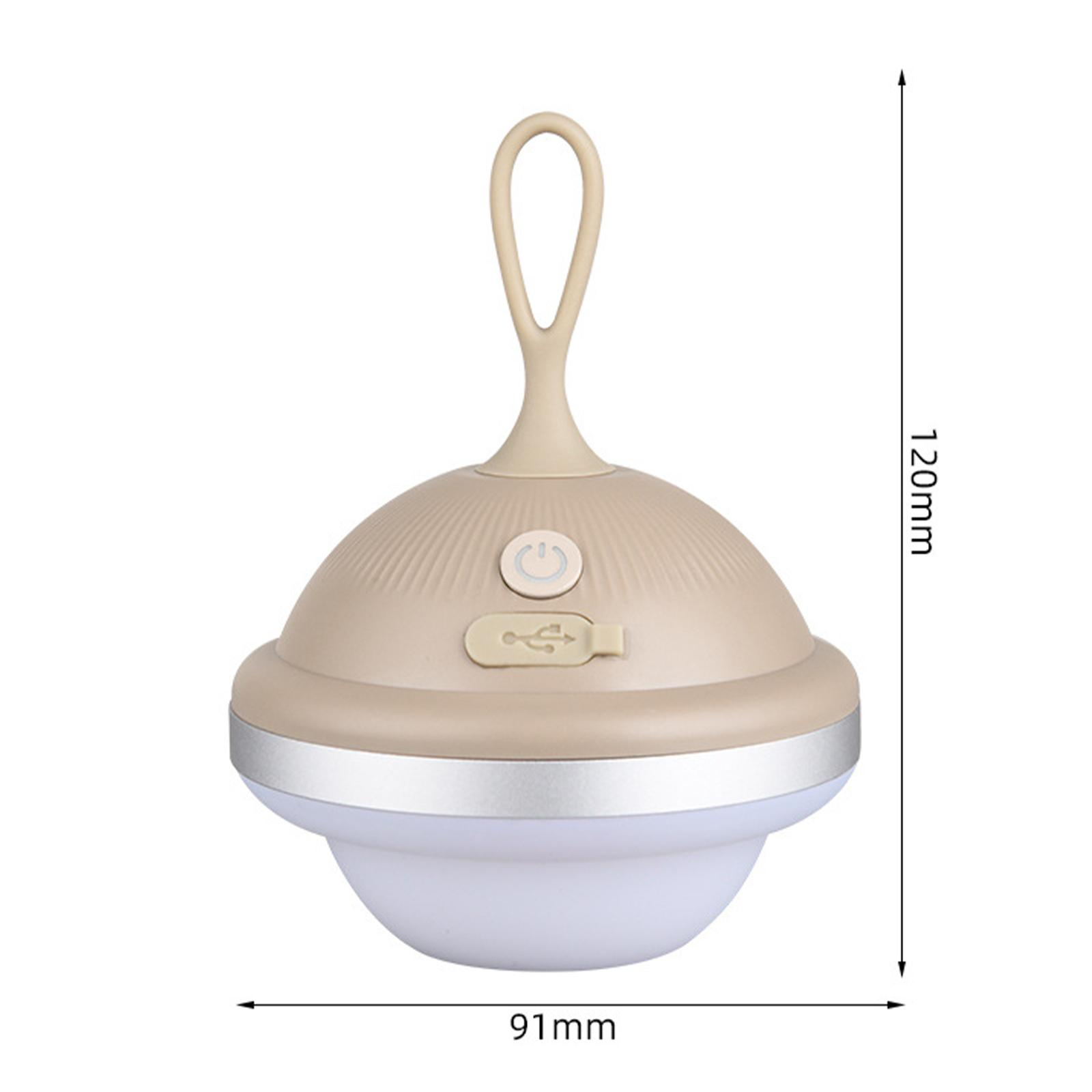 Eine beige Lampe mit Griff und USB-Anschluss. Sie ist 91 mm breit und 120 mm hoch.