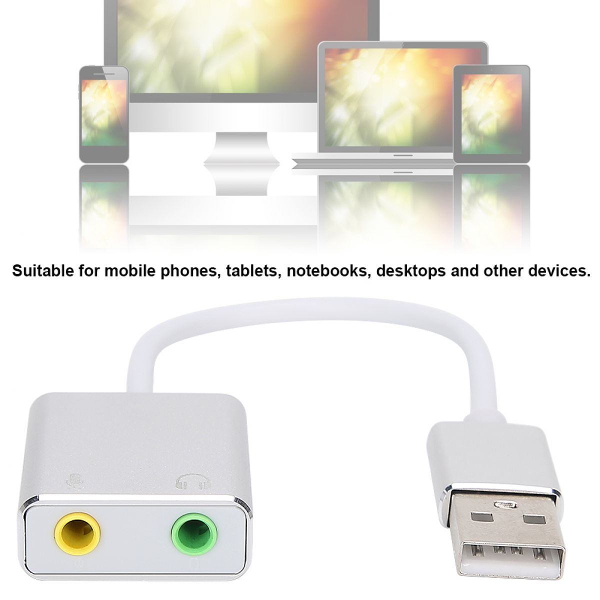 Ein weißer Audioadapter mit USB-Anschluss und Kopfhörer-/Mikrofonbuchsen. Der Hintergrund zeigt verschiedene elektronische Geräte.