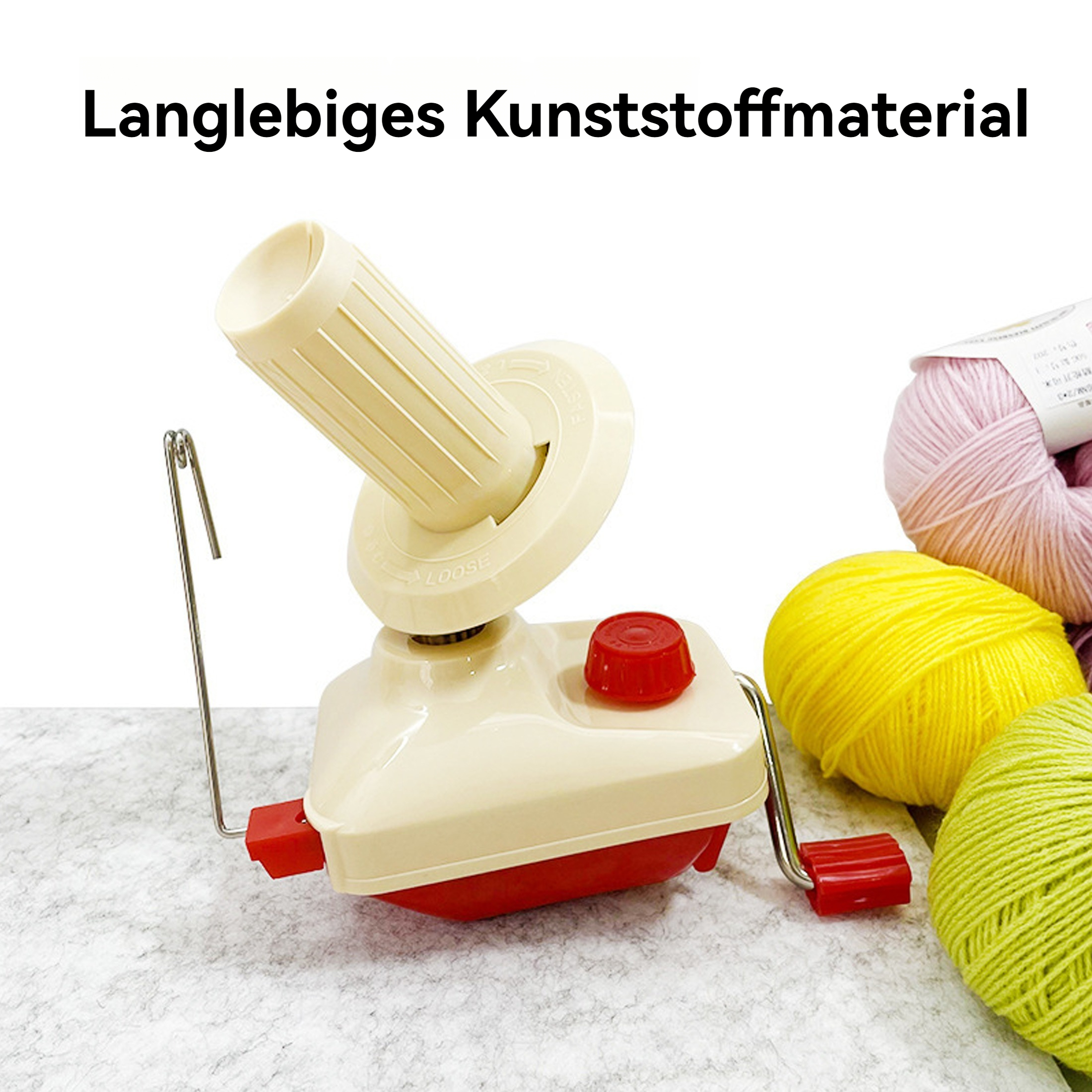 Creme- und roter Garnwickler mit gelben, grünen und rosa Garnkugeln. Weißer Hintergrund. Der Wickler hat eine Kurbel.