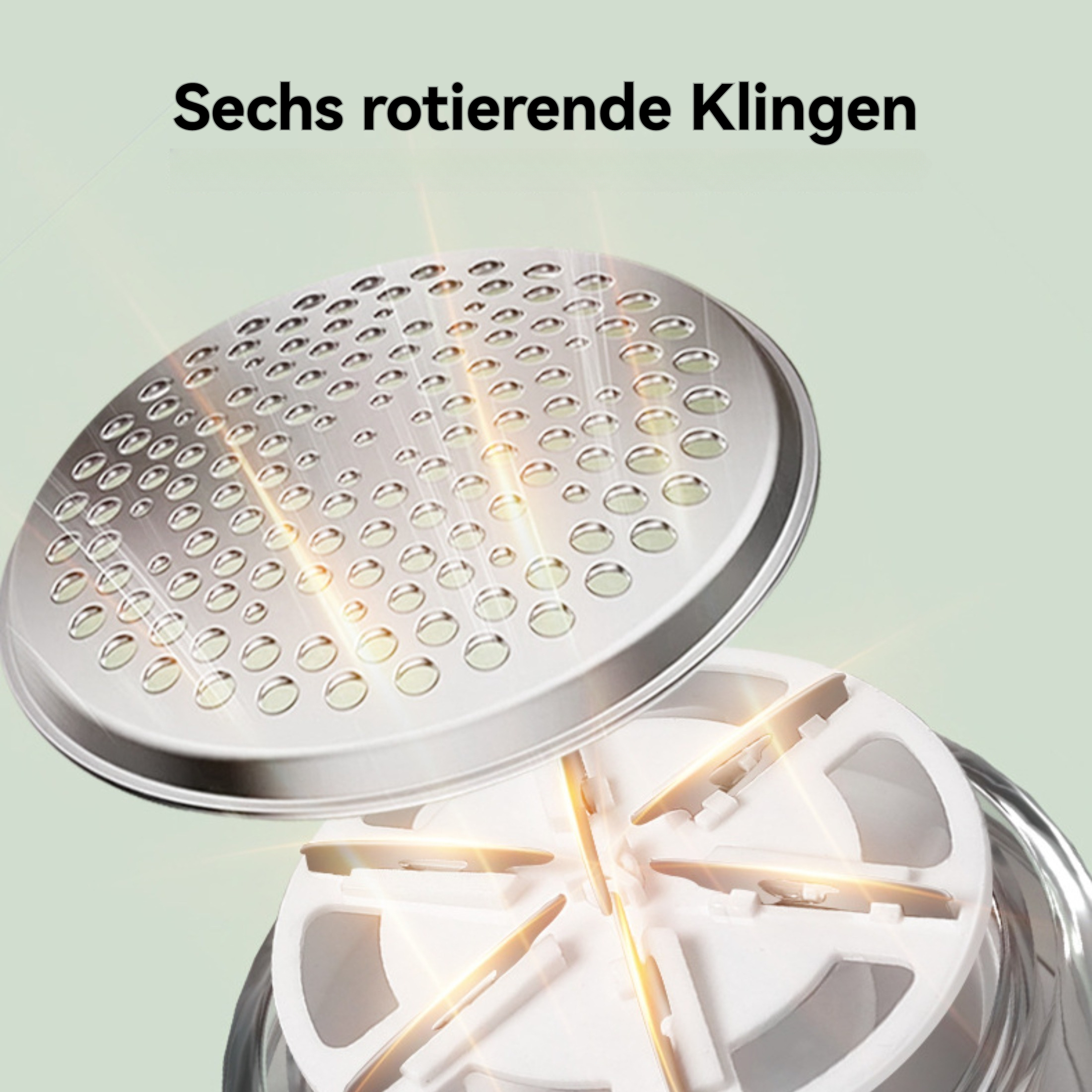 Nahaufnahme eines Metall-Lebensmittelreißers. Sechs Klingen sind sichtbar, mit einer perforierten Oberseite. Der Hintergrund ist hellgrün.