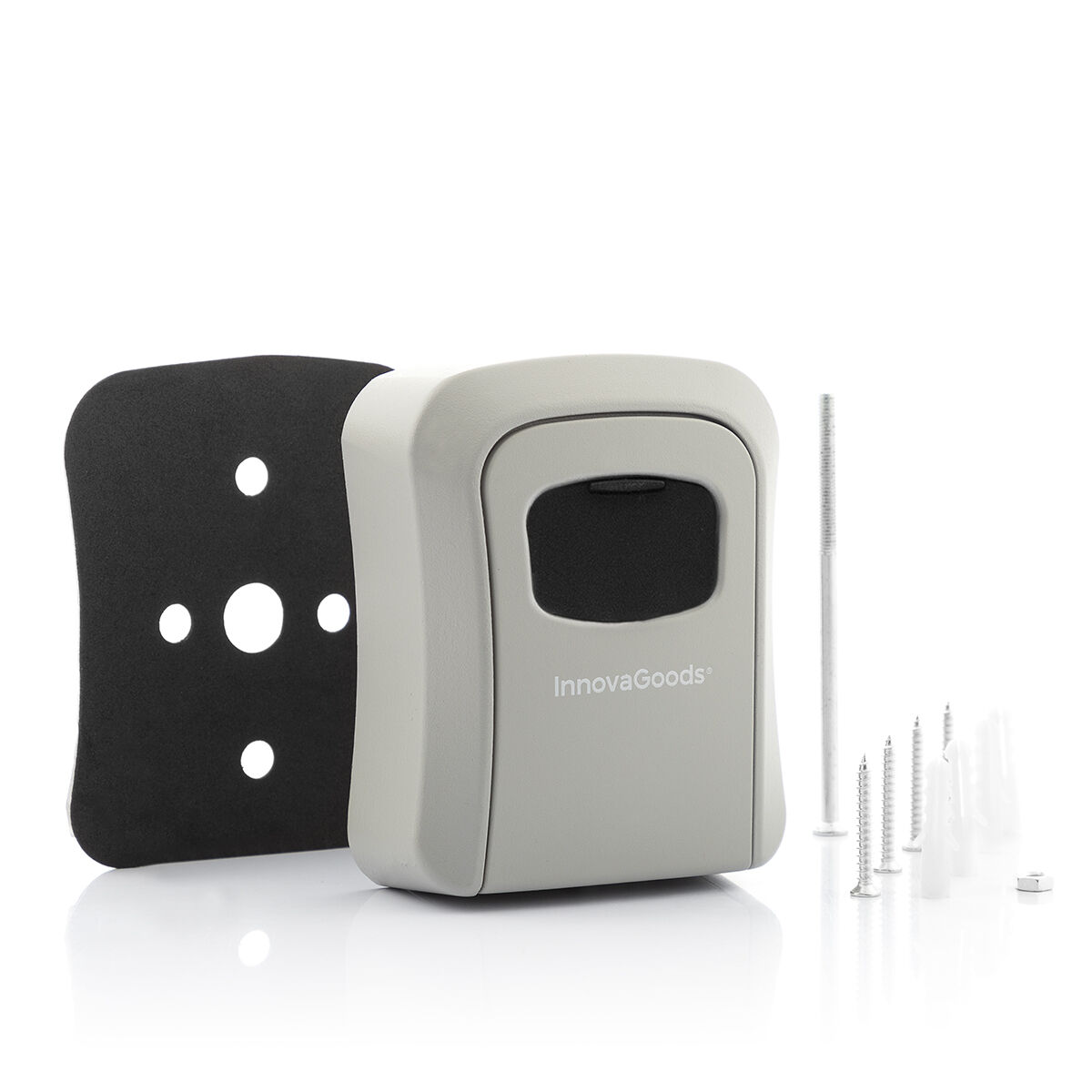 Una caja fuerte para llaves InnovaGoods gris con un respaldo de espuma negra y accesorios de montaje sobre fondo blanco.