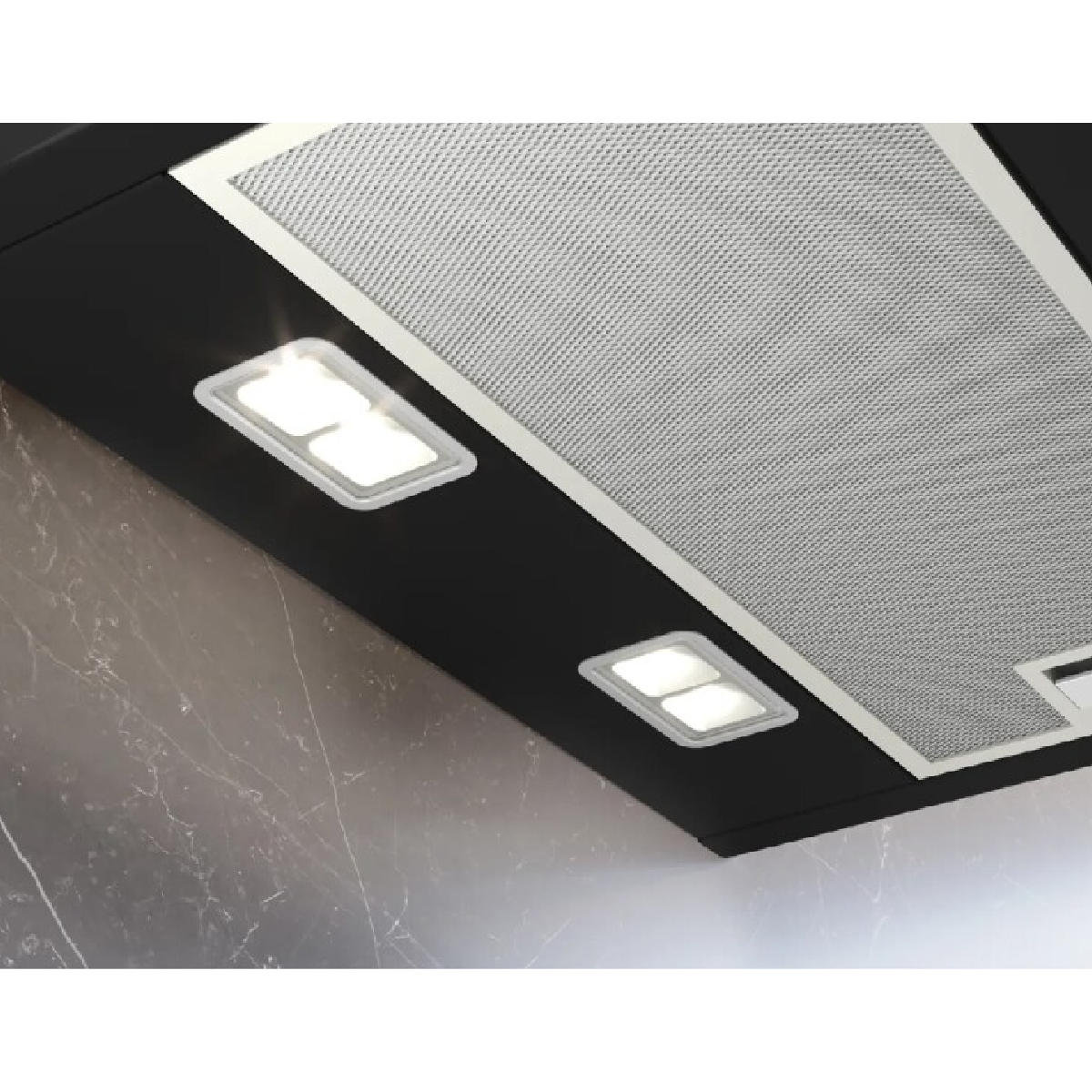 Close-up of a kitchen hood with bright lights. The hood is black with silver mesh and white trim. The background is a marbled wall.