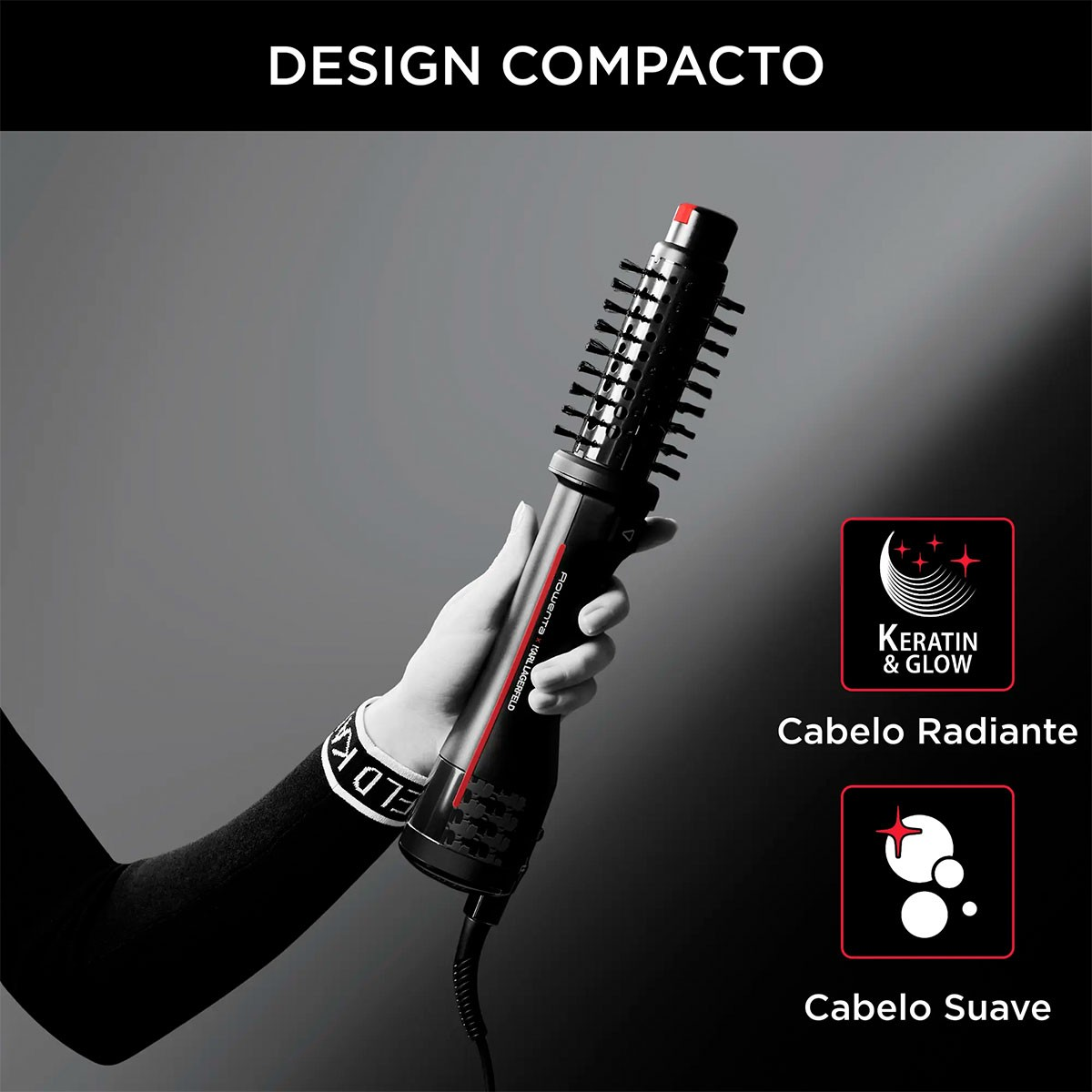 Eine Person hält einen schwarz-silbernen Haarstyler. Text lautet 'DESIGN COMPACTO', 'Keratin & Glow', 'Cabelo Radiante' und 'Cabelo Suave'.