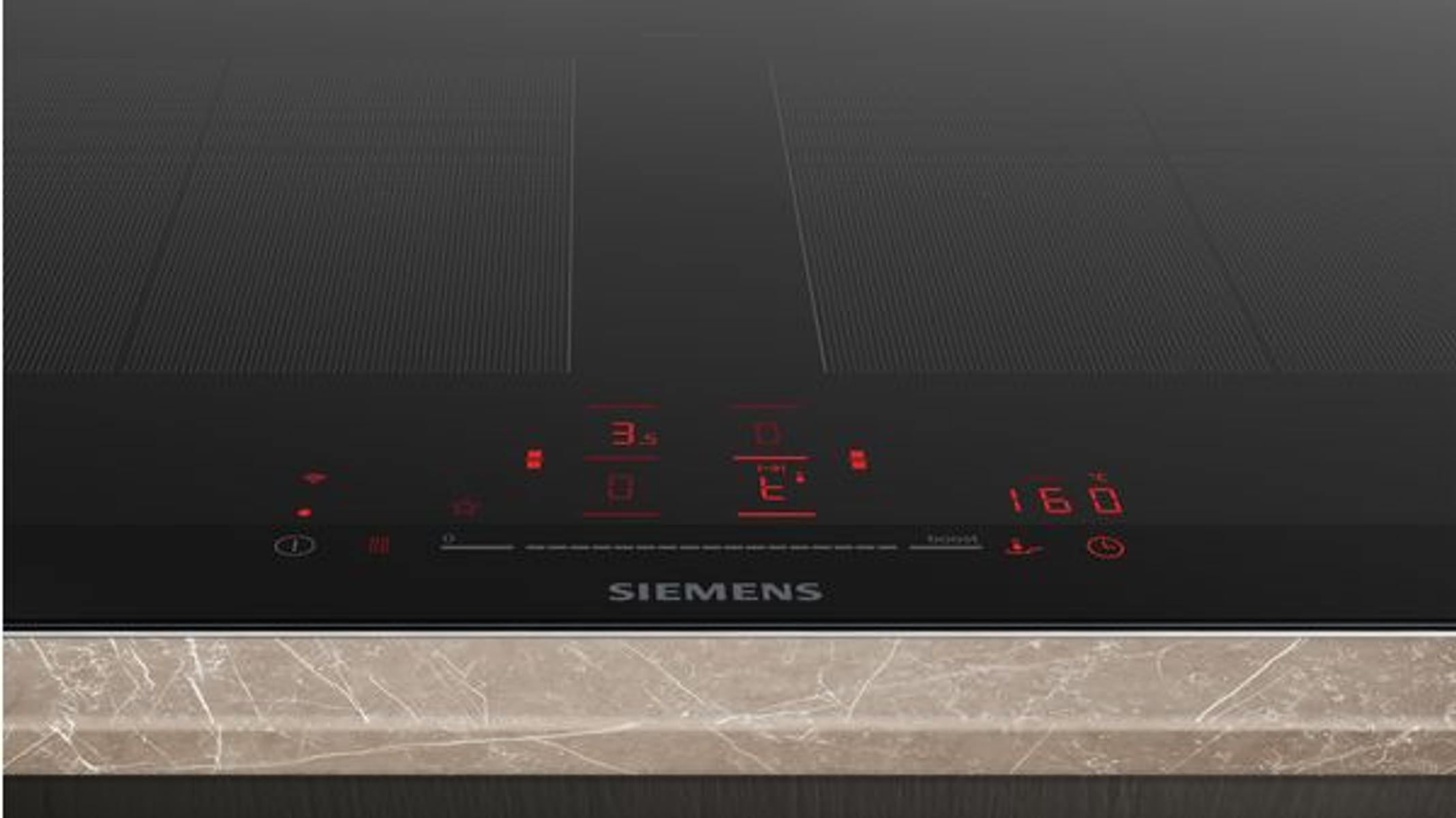 Czarna płyta indukcyjna Siemens z czerwonym wyświetlaczem. Pokazuje timer, poziom mocy i ustawienia temperatury. Marmurowy blat poniżej.