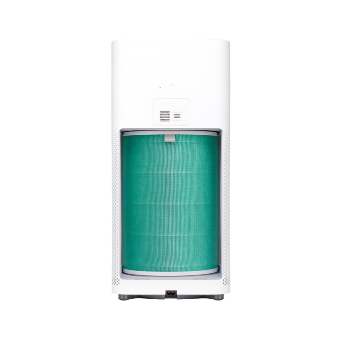 Biały oczyszczacz powietrza z zielonym filtrem widocznym przez prostokątny otwór. Stoi na białej powierzchni.