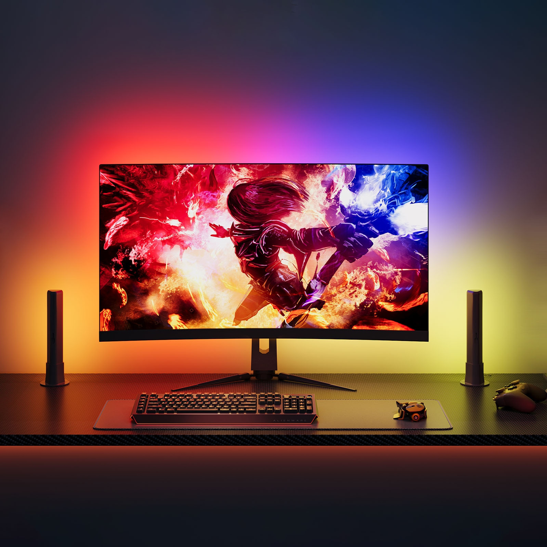 Une configuration de jeu avec un écran incurvé affichant une scène de bataille, clavier, tapis de souris, haut-parleurs et manettes.