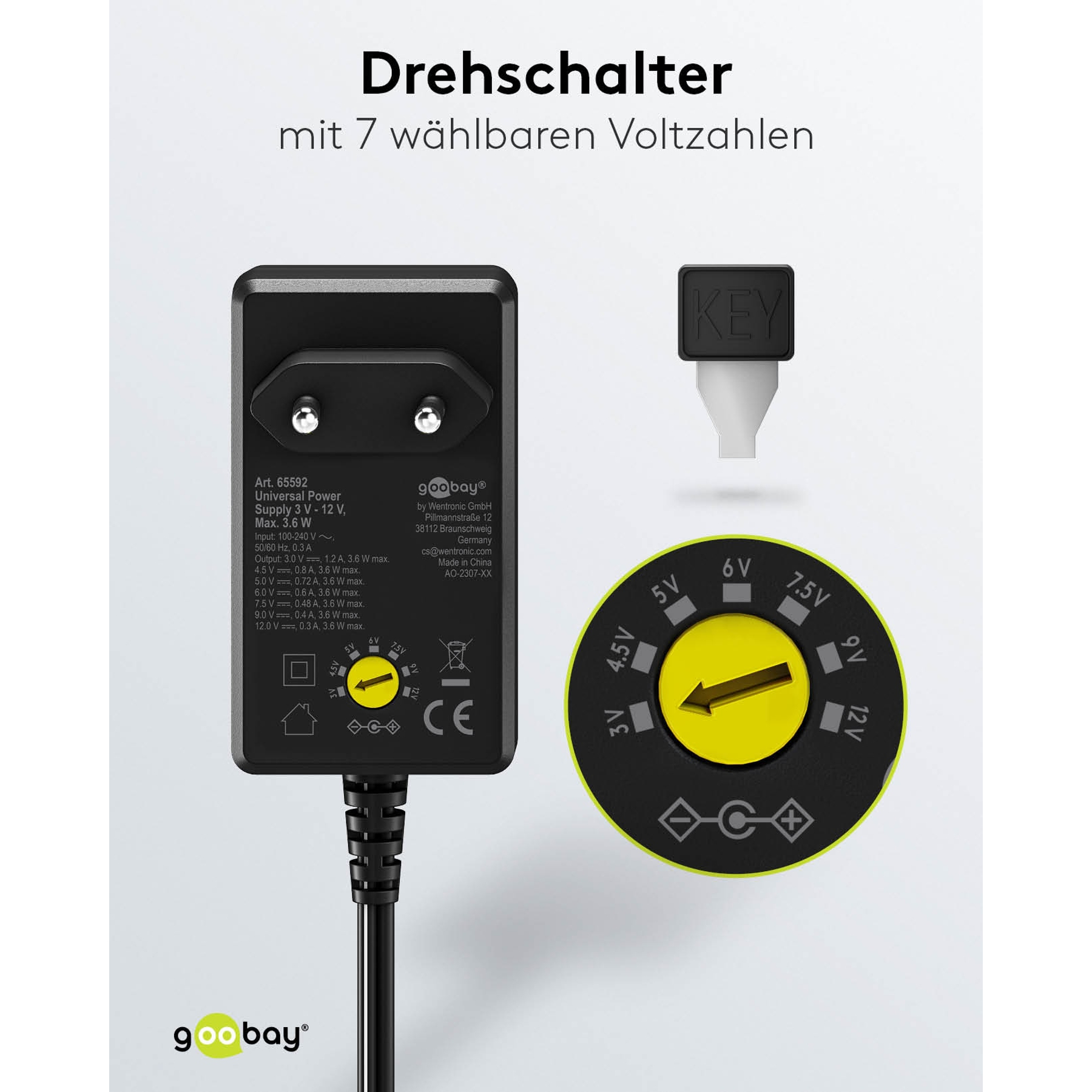 Black power adapter with voltage selector. Shows 3V, 4.5V, 5V, 6V, 7.5V, 9V, 12V settings. Includes a key.