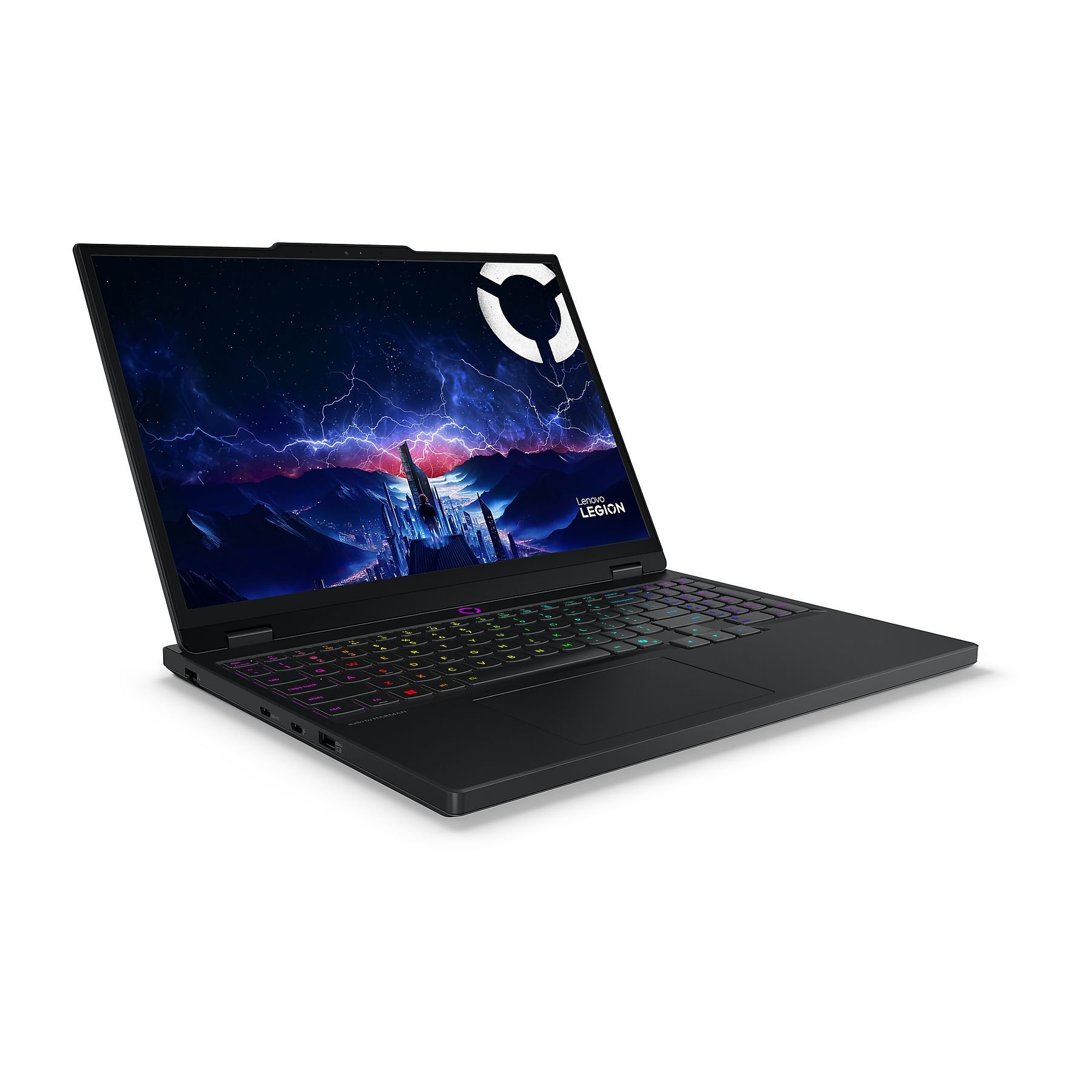 Un laptop Lenovo Legion nero è aperto. Lo schermo mostra un paesaggio urbano con fulmini. La tastiera si illumina di colore.