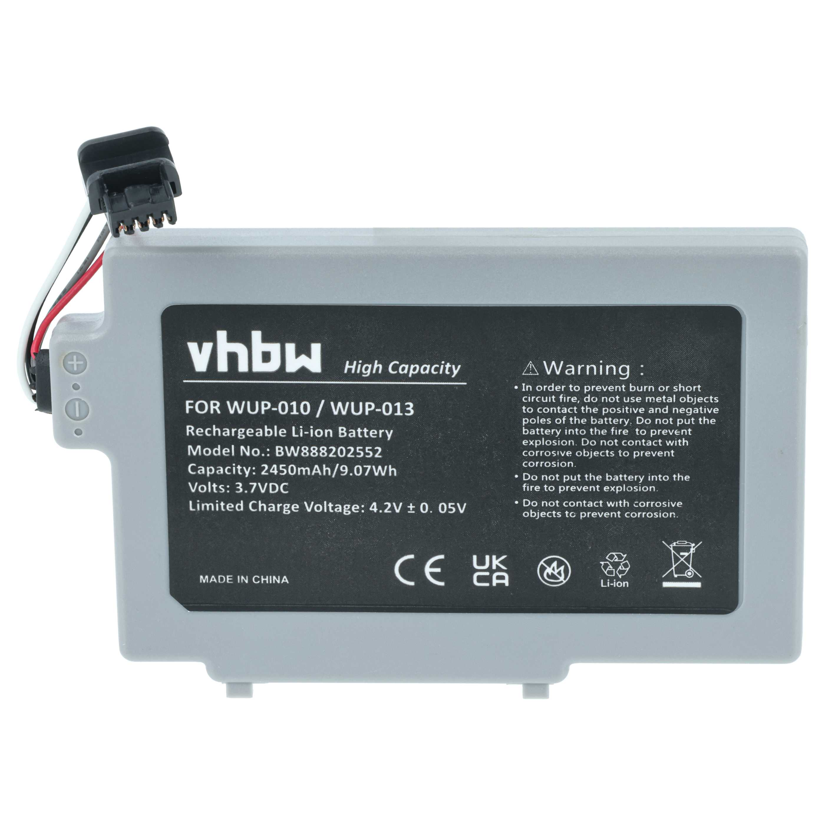 Ein grauer Akku mit schwarzem Text, einem Anschluss und einem Warnhinweis. Es steht 'Rechargeable Li-ion Battery' und 'High Capacity'.