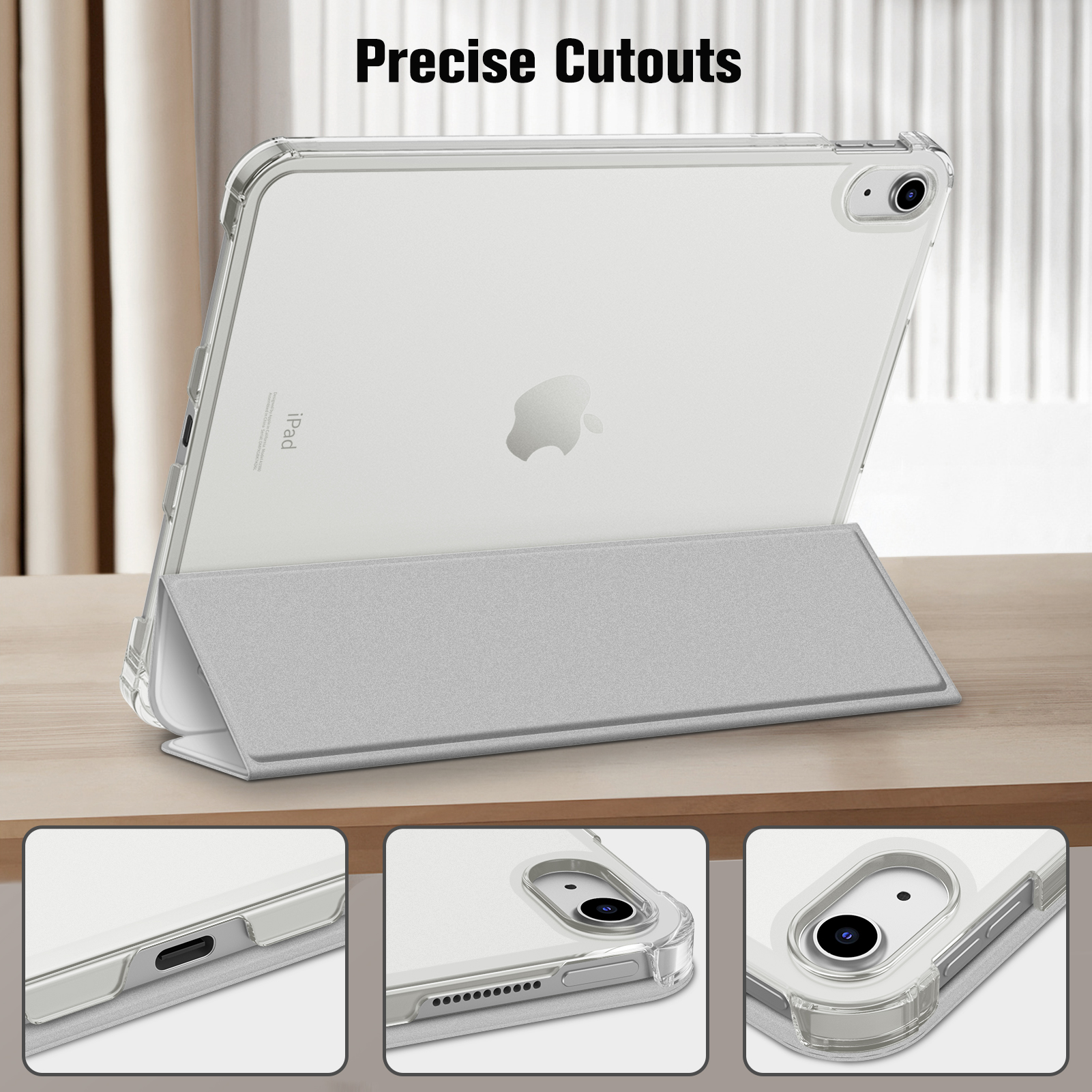 Ein iPad mit einer transparenten Hülle, abgestützt von einer grauen Hülle auf einem Holztisch, mit präzisen Aussparungen. Der Hintergrund ist unscharf.