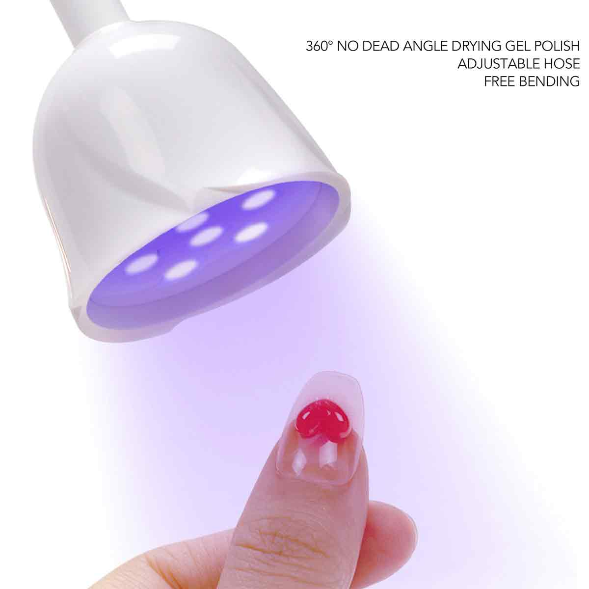 Ein Nagel unter einer UV-Lampe. Der Nagel hat ein rotes Herzdesign. Die Lampe ist weiß.