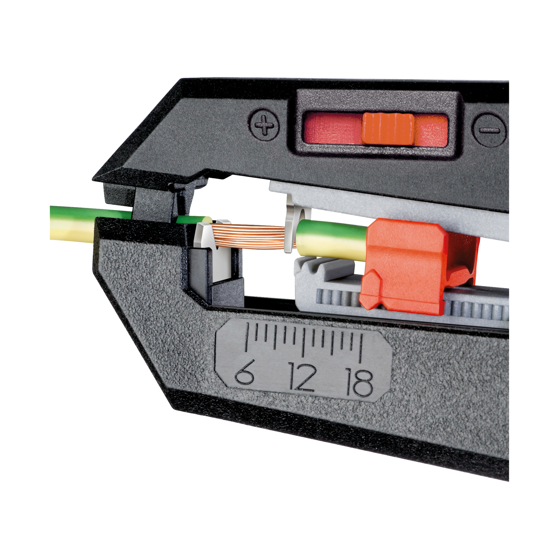 Close-up of a wire stripper tool. A green and yellow wire is being stripped. The tool is black and has a red switch.