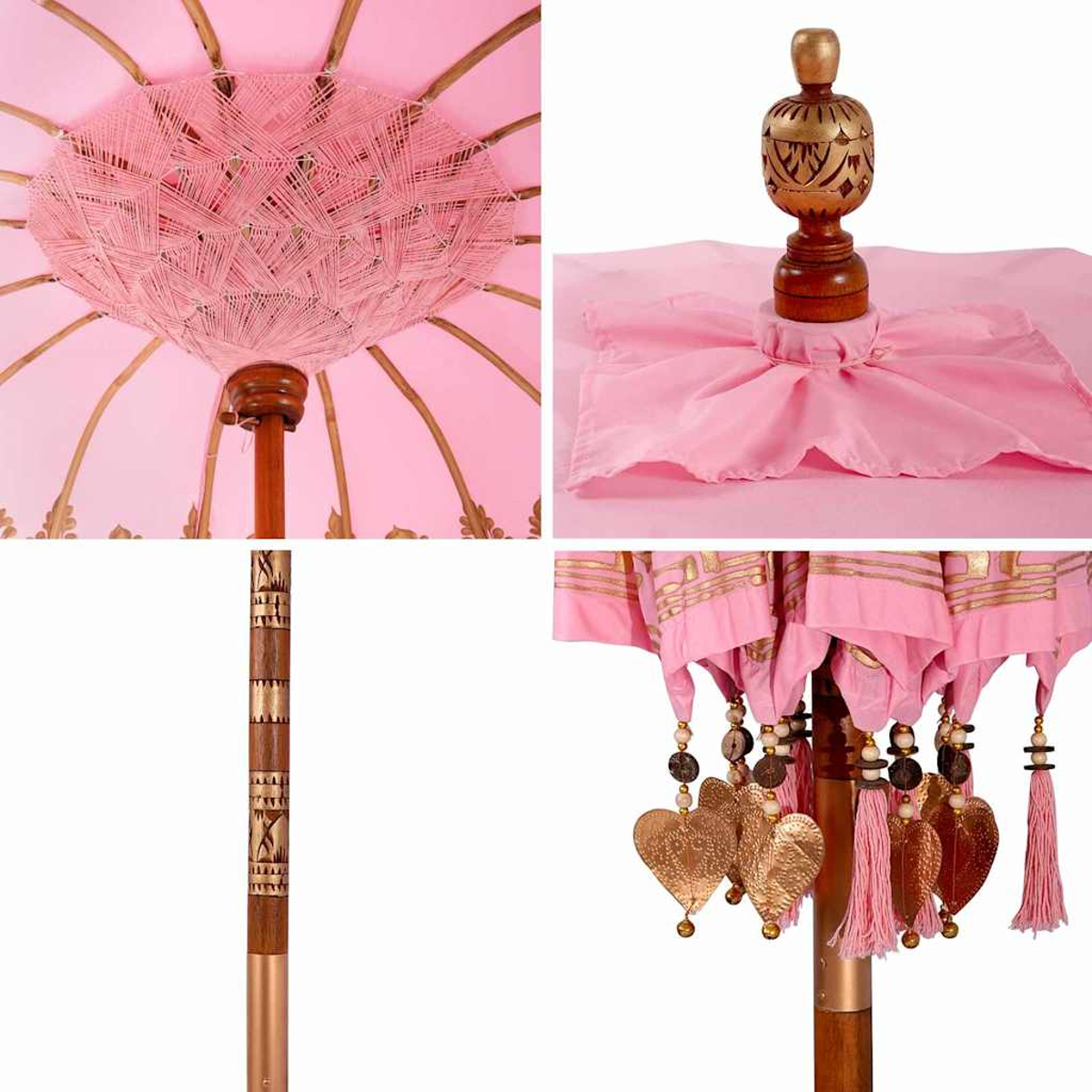 Rosa Schirm mit goldenen Akzenten, Holzstange, herzförmigen Anhängern und Quasten. Detaillierte Nahaufnahmen des Designs und der Konstruktion.