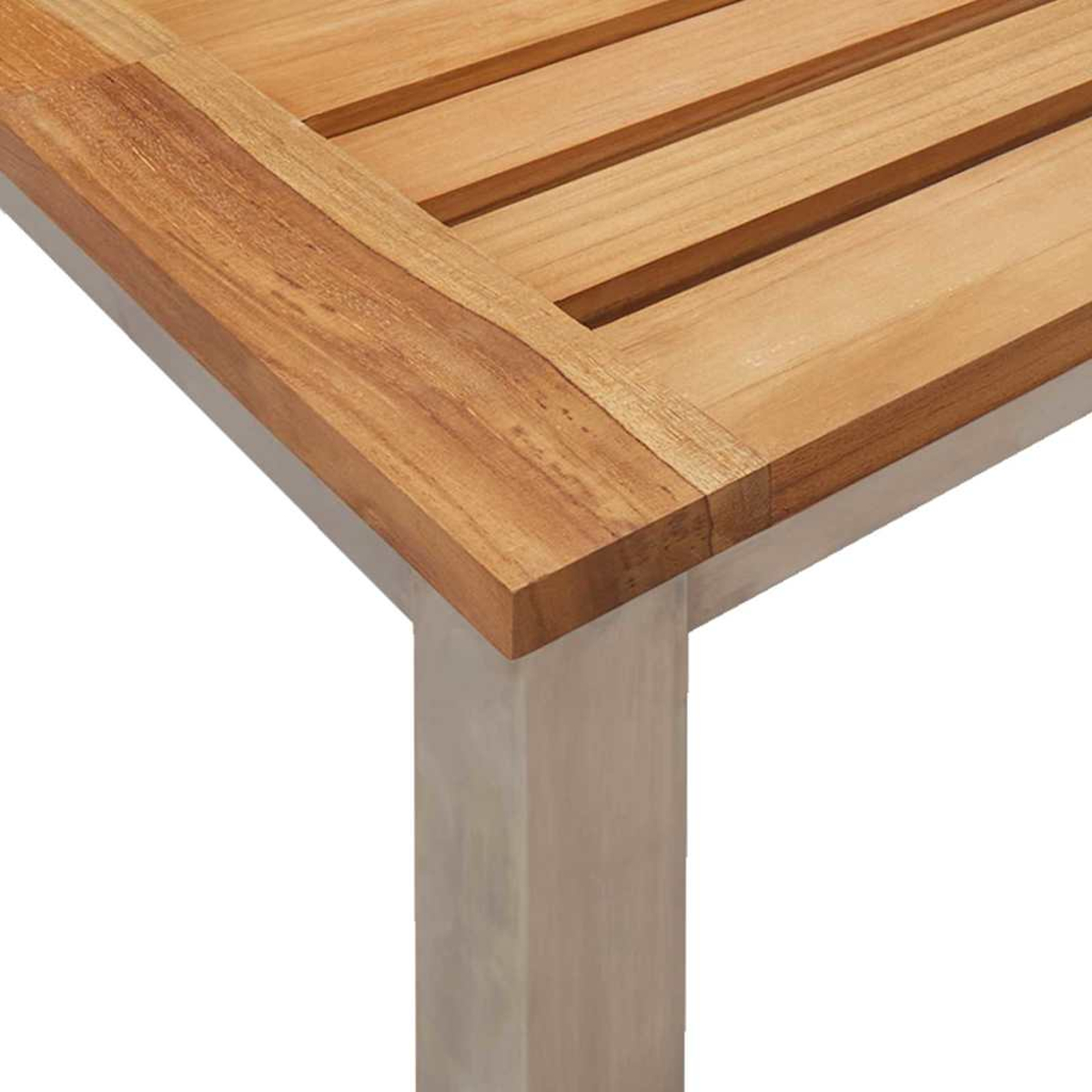 Nahaufnahme einer Holztischecke. Die Tischplatte ist braun mit horizontalen Lamellen. Das Bein ist ein hellgraues Rechteck.