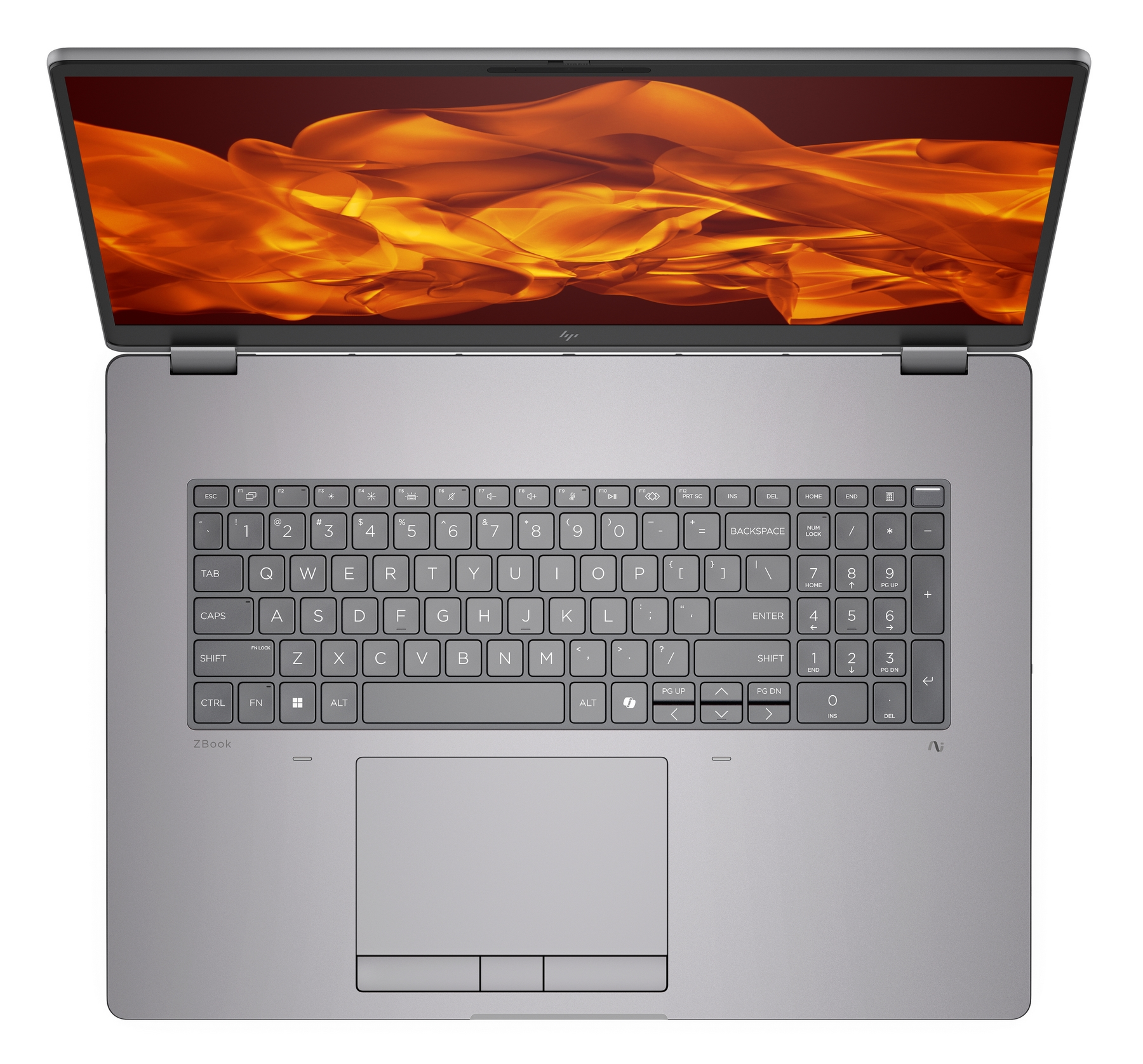 Un laptop grigio è aperto, mostrando un design astratto arancione e rosso sullo schermo. Tastiera e touchpad visibili.