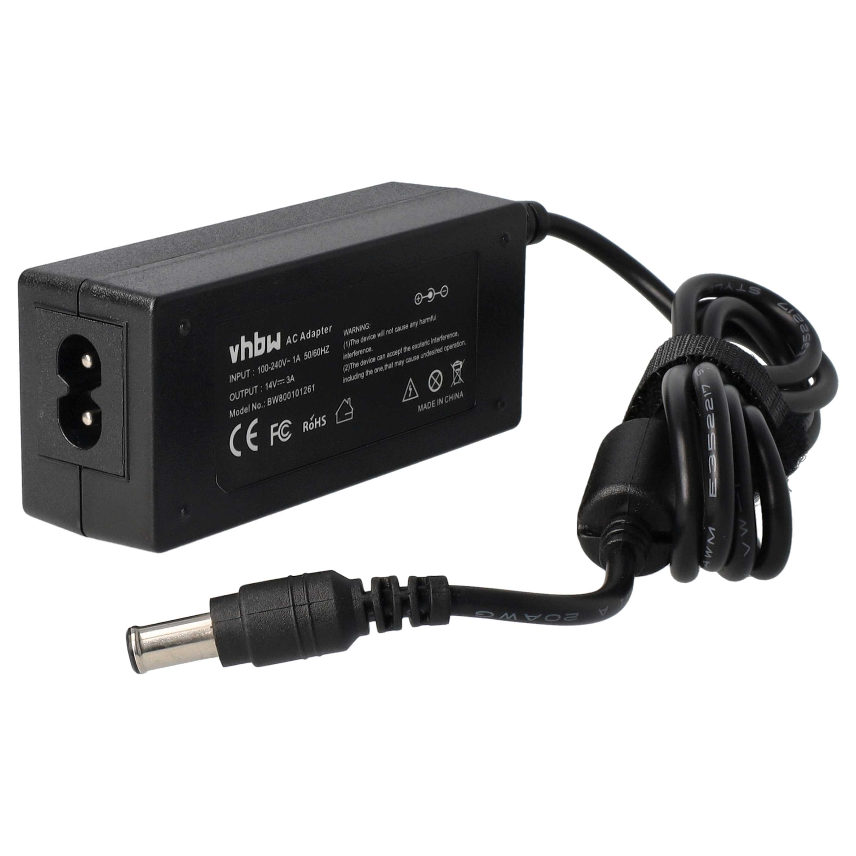 Ein schwarzes Netzteil mit Netzstecker und Gleichstromanschluss. Der Adapter hat Text und ein Kabel.