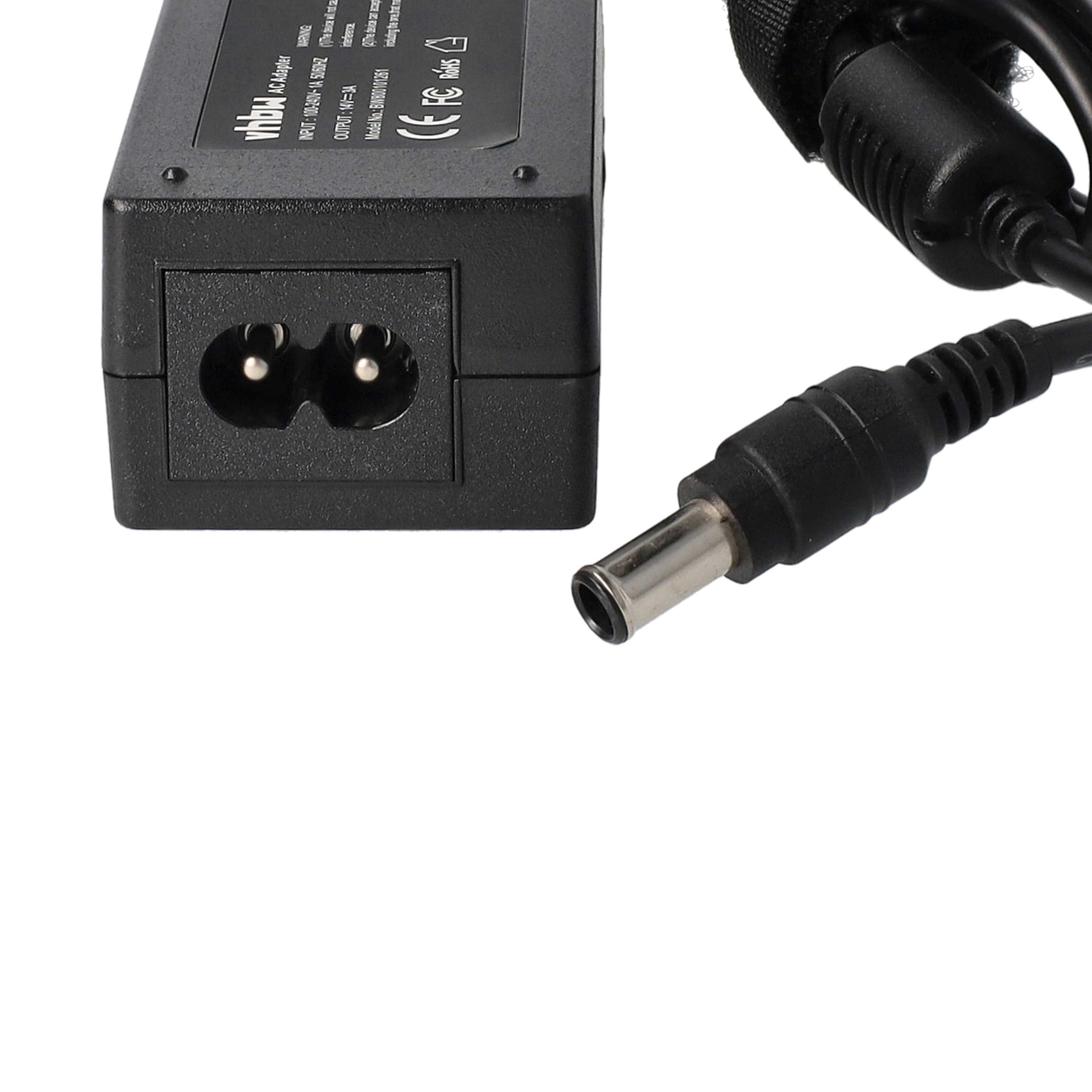 Ein schwarzes AC-Adapter mit einem Stromanschluss, einem DC-Stecker und einem schwarzen Stromkabel. Der Adapter hat Text darauf.