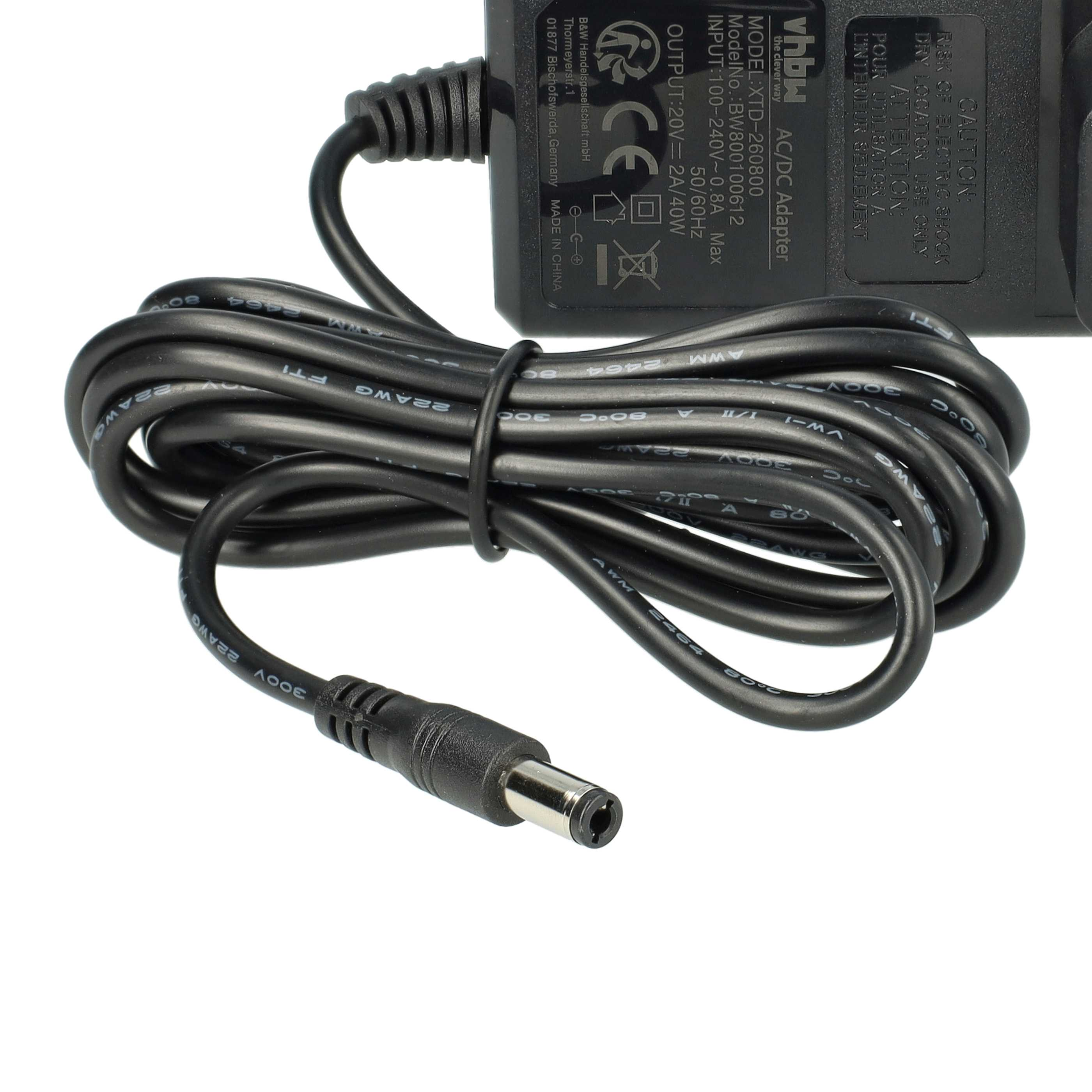 Ein AC/DC-Adapter mit schwarzem Kabel, Stecker und Produktinformationen. Weißer Hintergrund.