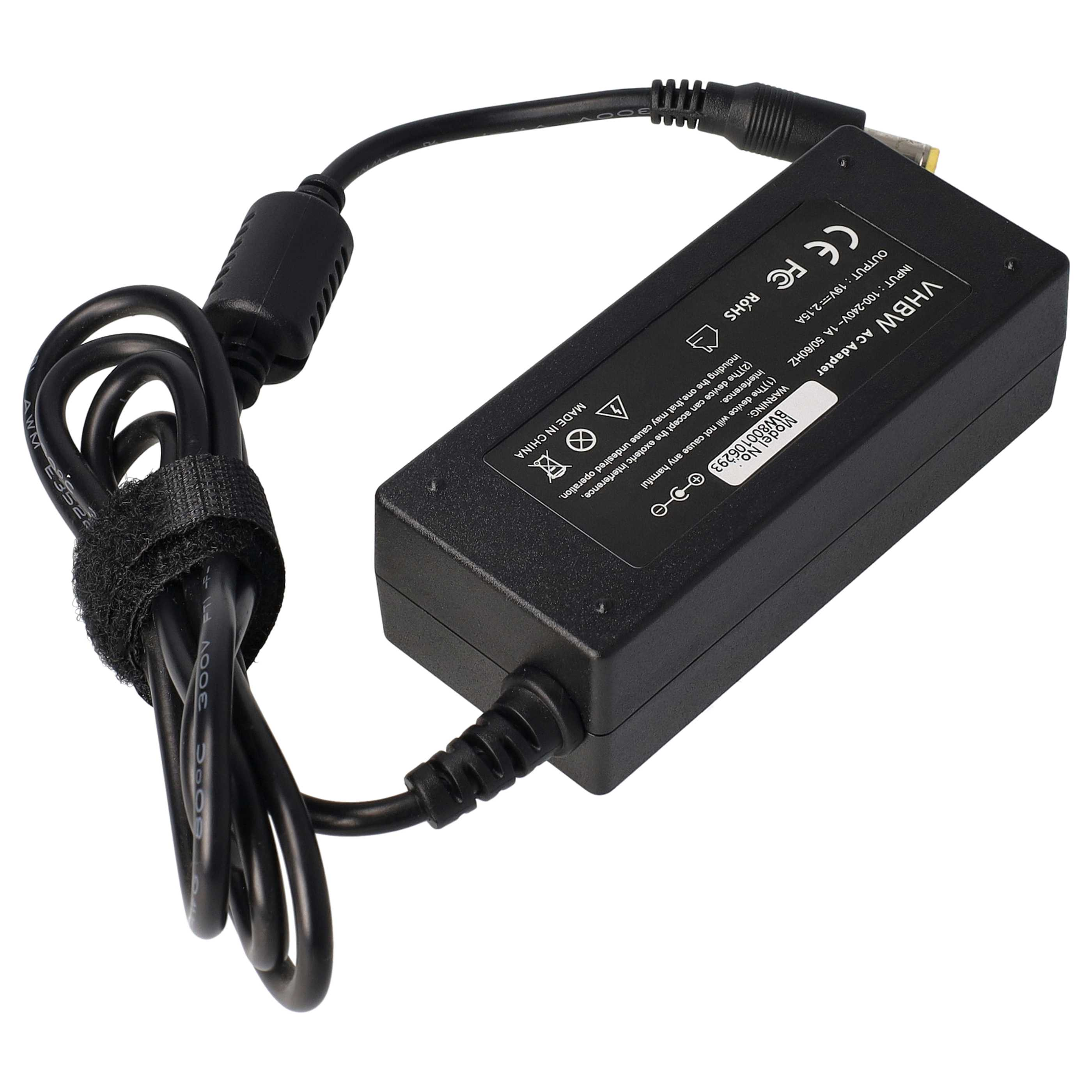Schwarzes VHBW AC-Netzteil mit angeschlossenem Kabel, umwickelt mit Klettverschluss. Es hat Sicherheitssymbole und technische Details.