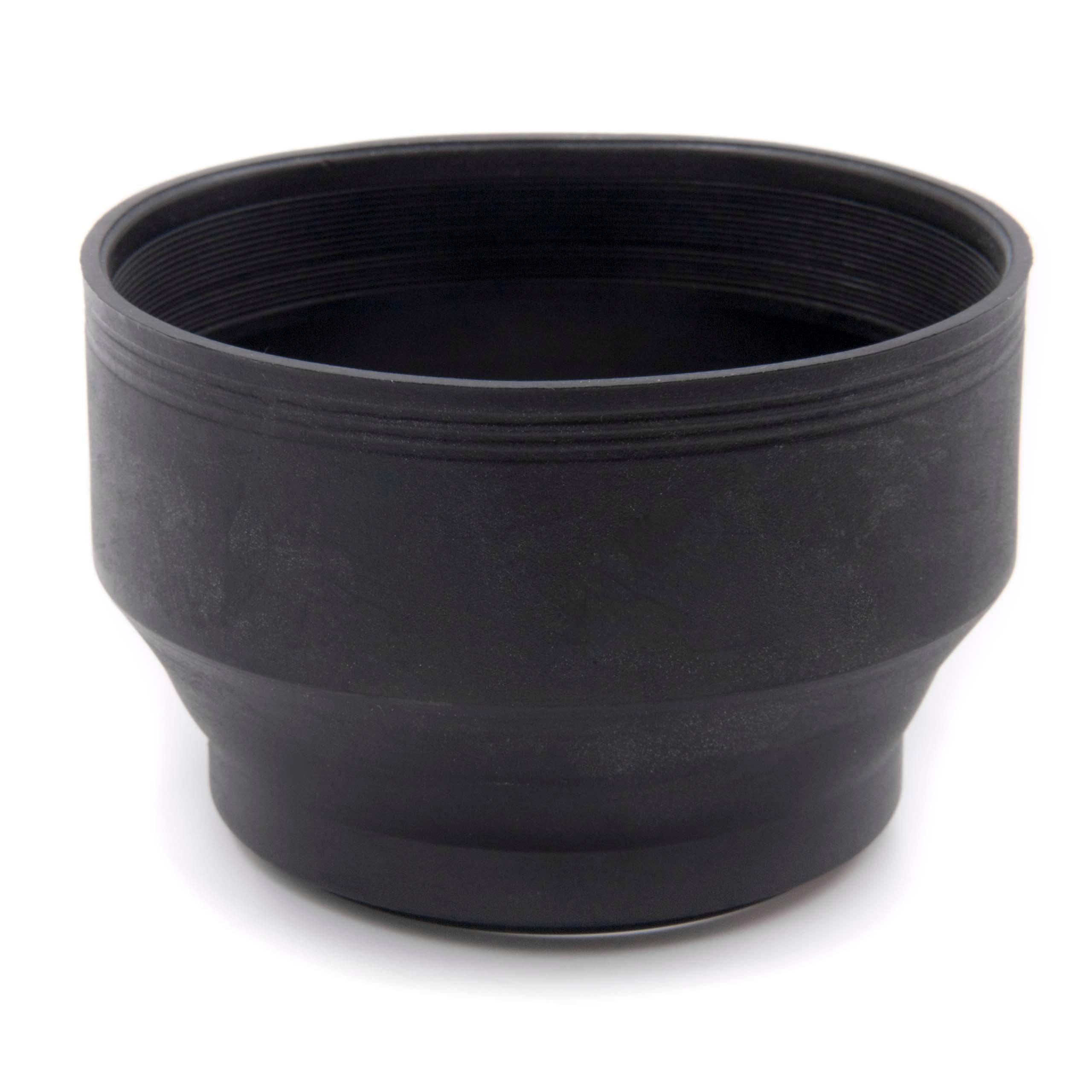 Eine schwarze Sonnenblende steht auf einer weißen Oberfläche. Sie hat eine zylindrische Form mit horizontalen Rippen.