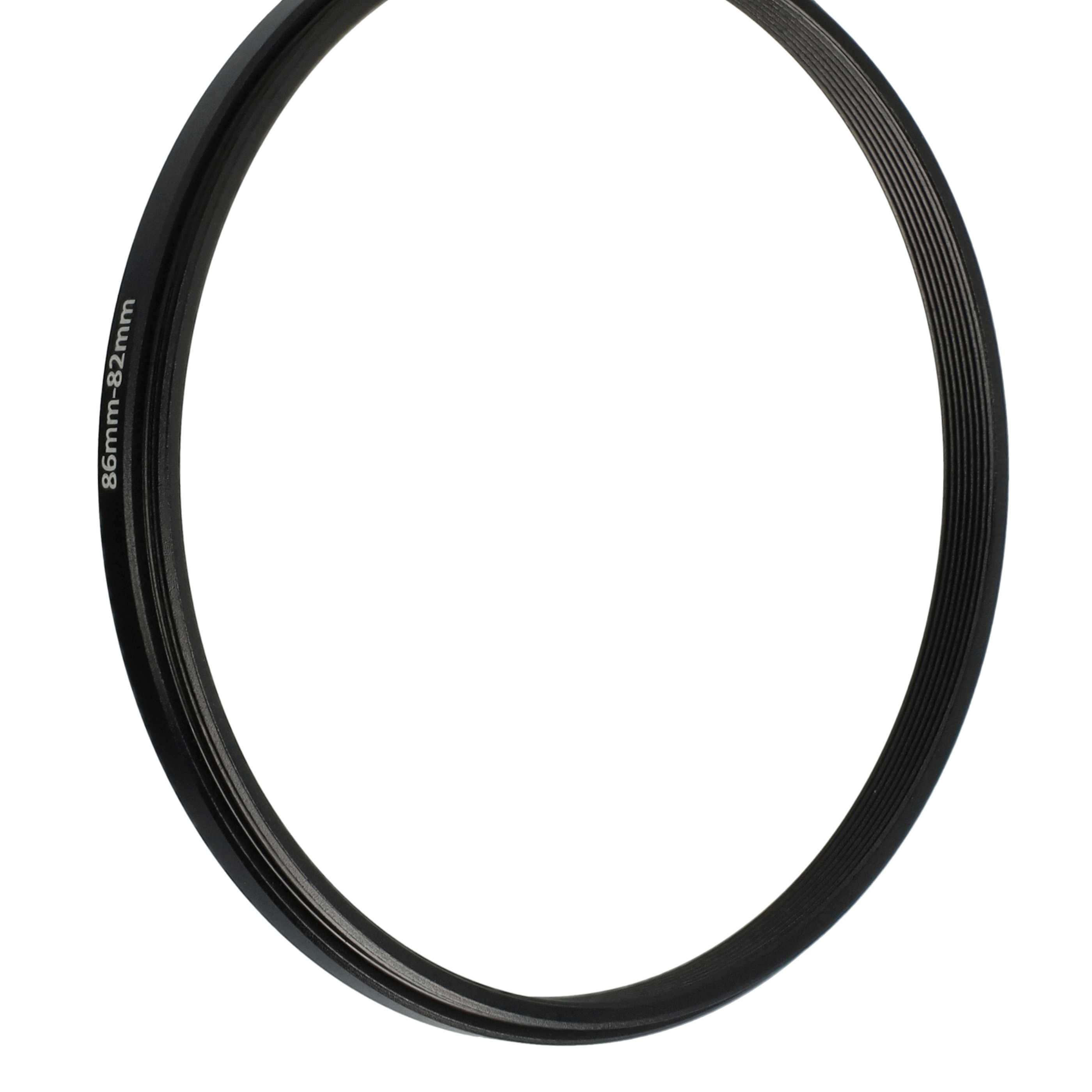 Ein schwarzer, kreisförmiger Ring mit gerippter Textur innen, markiert mit 86mm-82mm, vor weißem Hintergrund.