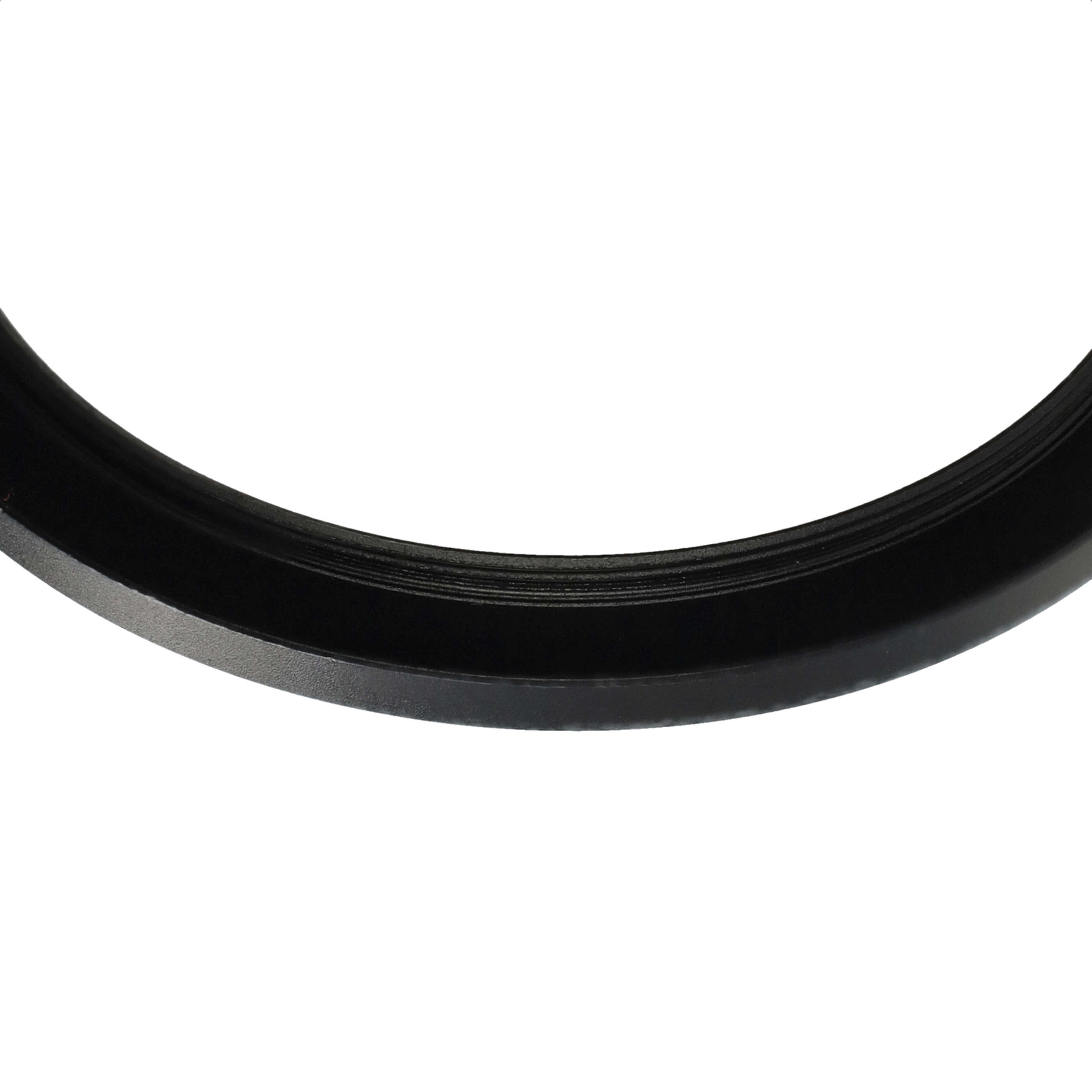 Nahaufnahme eines schwarzen, gebogenen Rings mit weißem Hintergrund. Der Ring hat eine strukturierte Innenfläche.