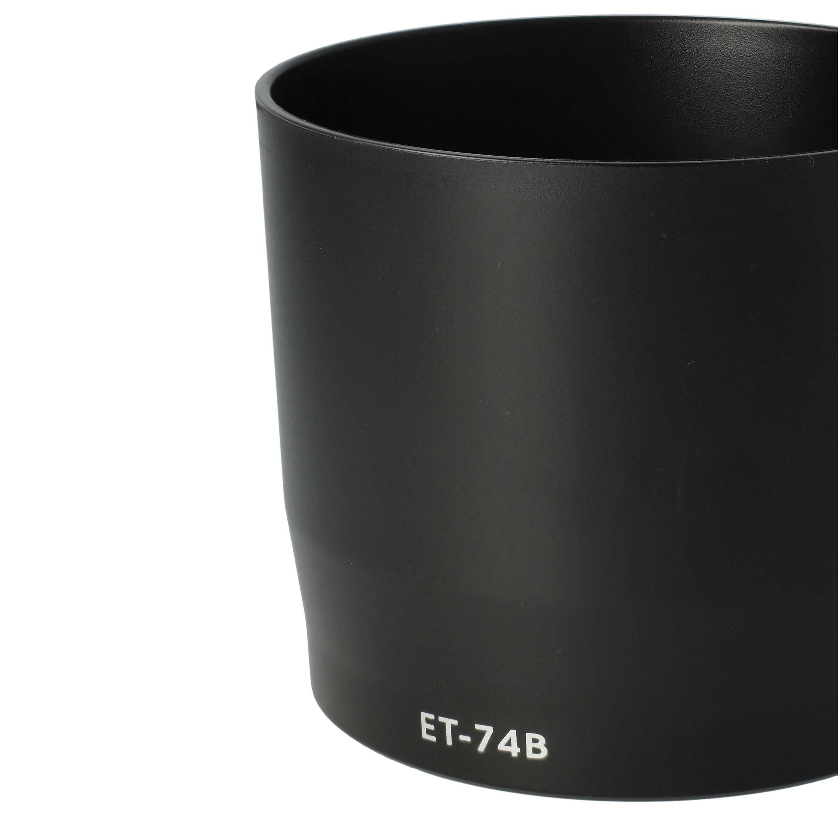 Eine schwarze Objektivblende mit weißem Text 'ET-74B' ist zu sehen. Der Hintergrund ist weiß.